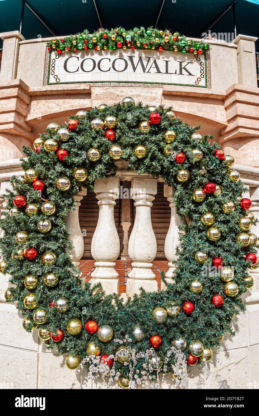 Miami Florida,Coconut Grove CocoWalk,shopping dining entertainment complex,Christmas winter holiday decoration decorations wreath, Stock Photo