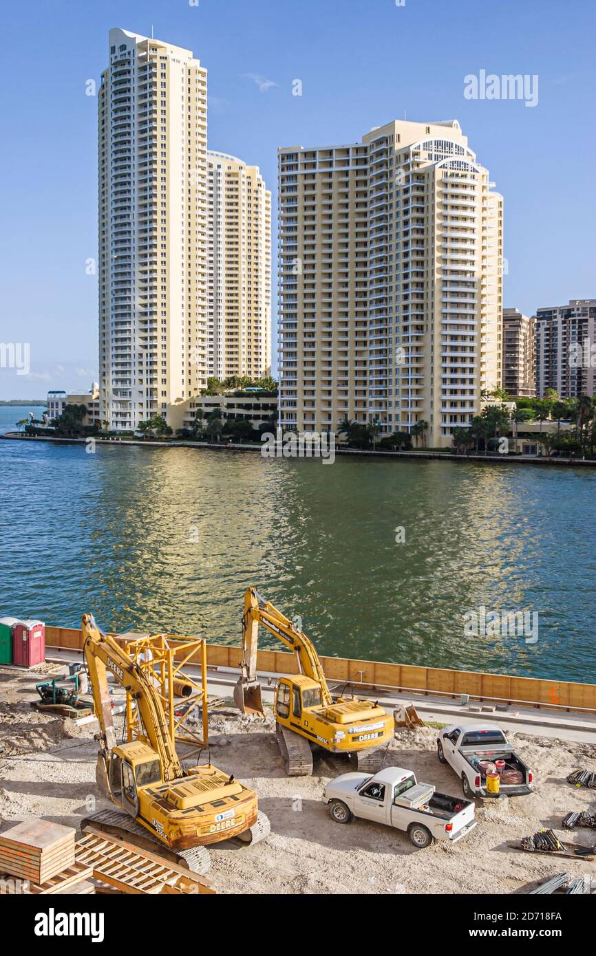 Miami Florida,Miami River water high rise building buildings,condominium residential apartment apartments under new construction site, Stock Photo
