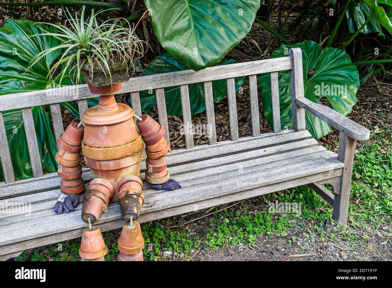 Miami Florida,Coral Gables Fairchild Tropical Garden,art installation bench human figure, Stock Photo