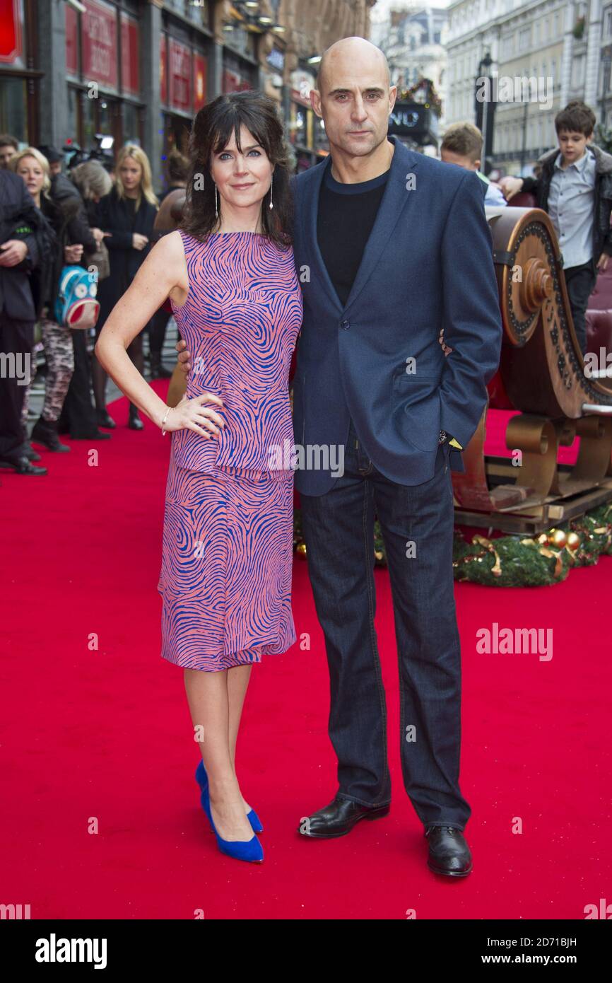 Mark Strong and Liza Marshall attending the premiere of Get Santa, at the Vue cinema in Leixester Square, London Stock Photo