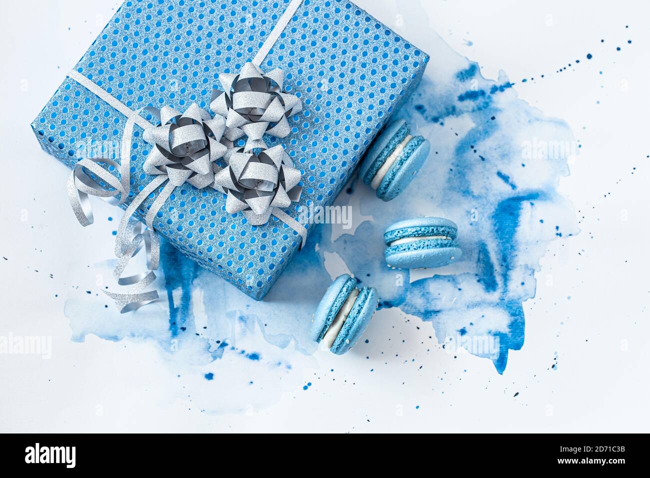 Beautiful blue gift box on watercolor background Stock Photo - Alamy