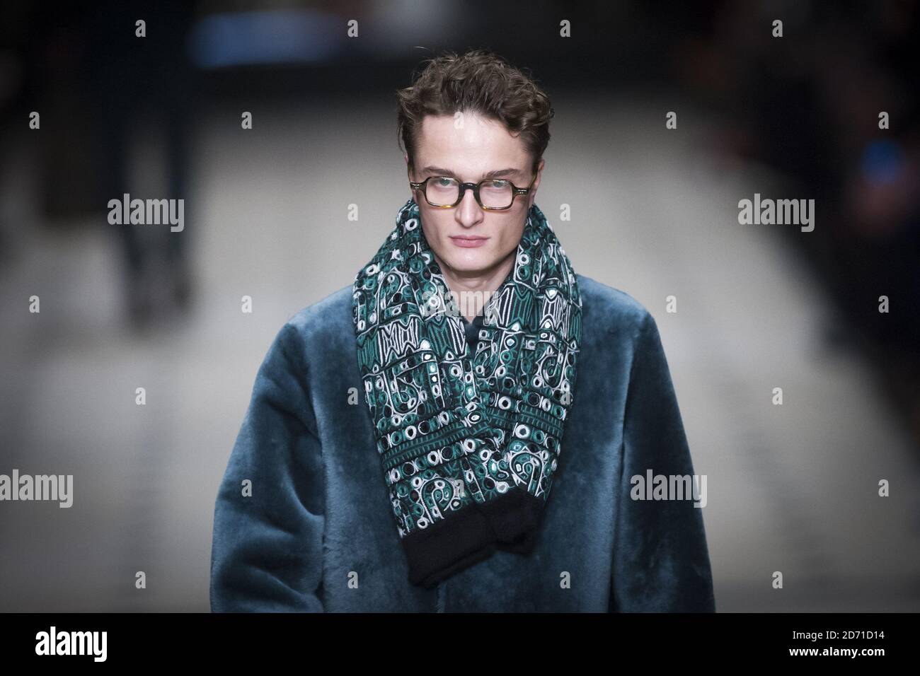 Model on the catwalk during the Burberry Prorsum Menswear Autumn Winter 2015 fashion show held Kensington Gardens, part of London Collections: Men 2015 Stock Photo