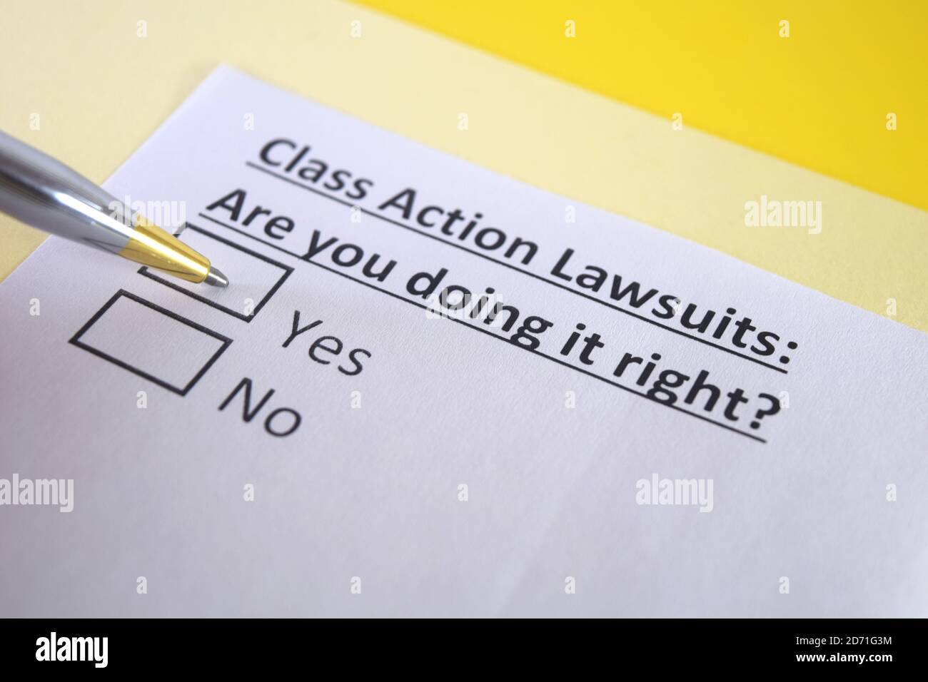 One person is answering question about class action lawsuits. Stock Photo