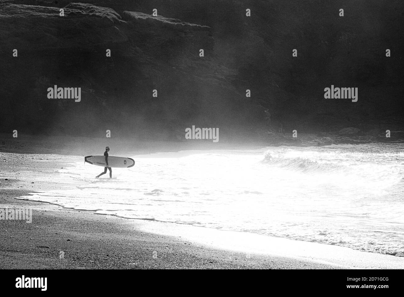 walking in Cornwall, Cornish walks,  surfer, training to be lifeguards, keeping Cornish beaches safe Cornwall,RNLI Lifeguard cover Stock Photo