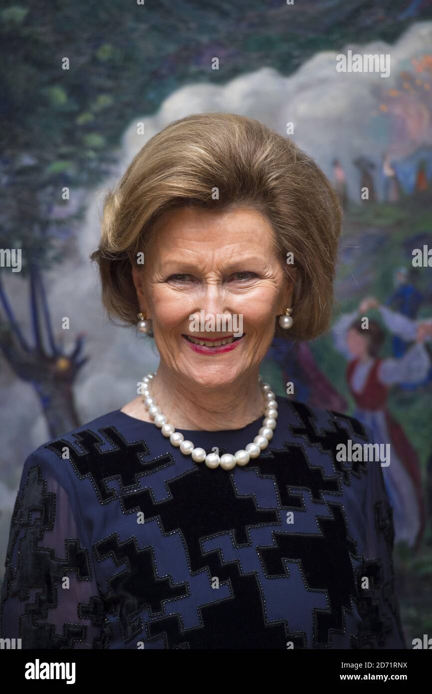 Her Majesty Queen Sonja of Norway pictured in front of 'Midsummer Eve Bonfire', during a visit to the Nikolai Astrup exhibition, at Dulwich Picture Gallery in south London. Stock Photo