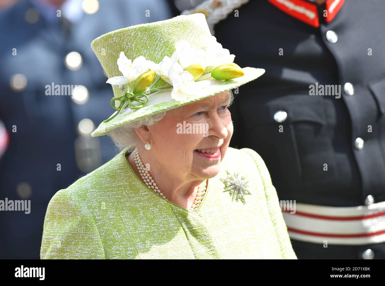 Queen Elizabeth II greets crowds outside Windsor Castle in Berkshire as she celebrates her 90th birthday.  Photo credit should read: Matt Crossick/ EMPICS Entertainment  Stock Photo