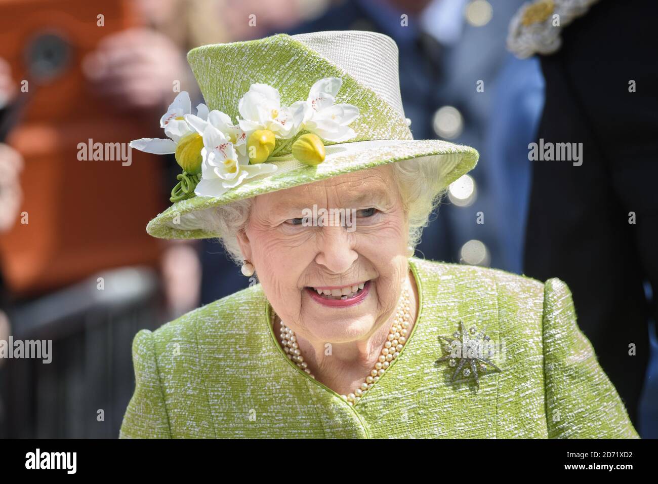 Queen Elizabeth II greets crowds outside Windsor Castle in Berkshire as