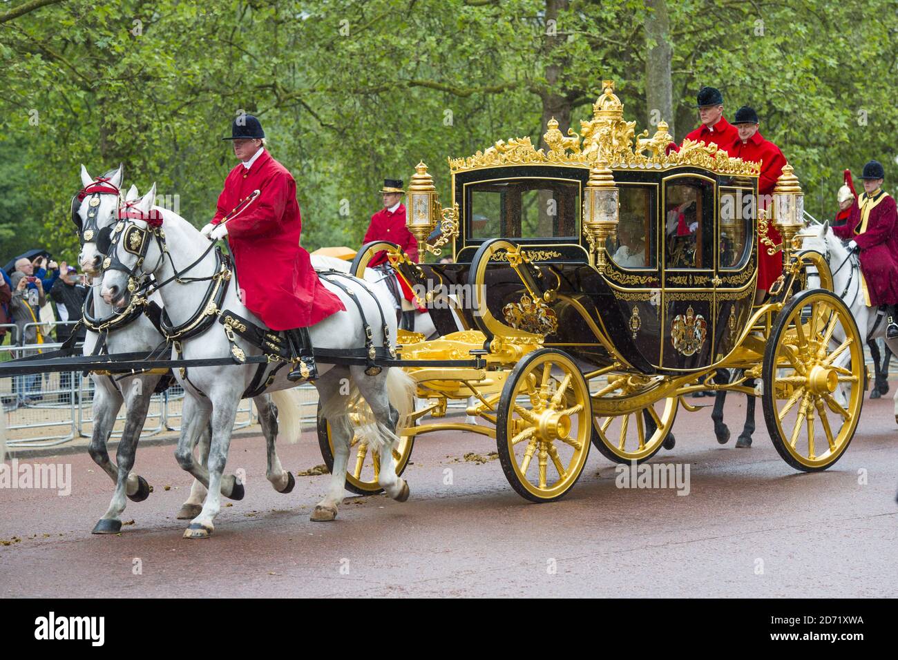 The Irish State Coach transporting Queen Elizabeth II travels along The ...