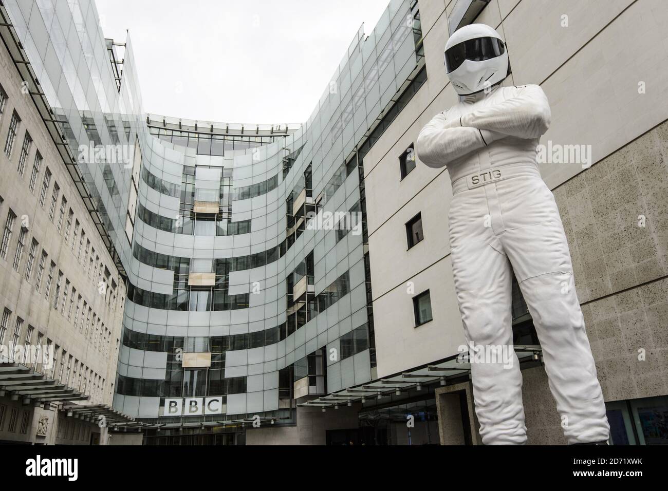 A giant statue of The Stig stands outside BBC Broadcasting House in central London, ahead of the new series of Top Gear which airs later this month. Stock Photo