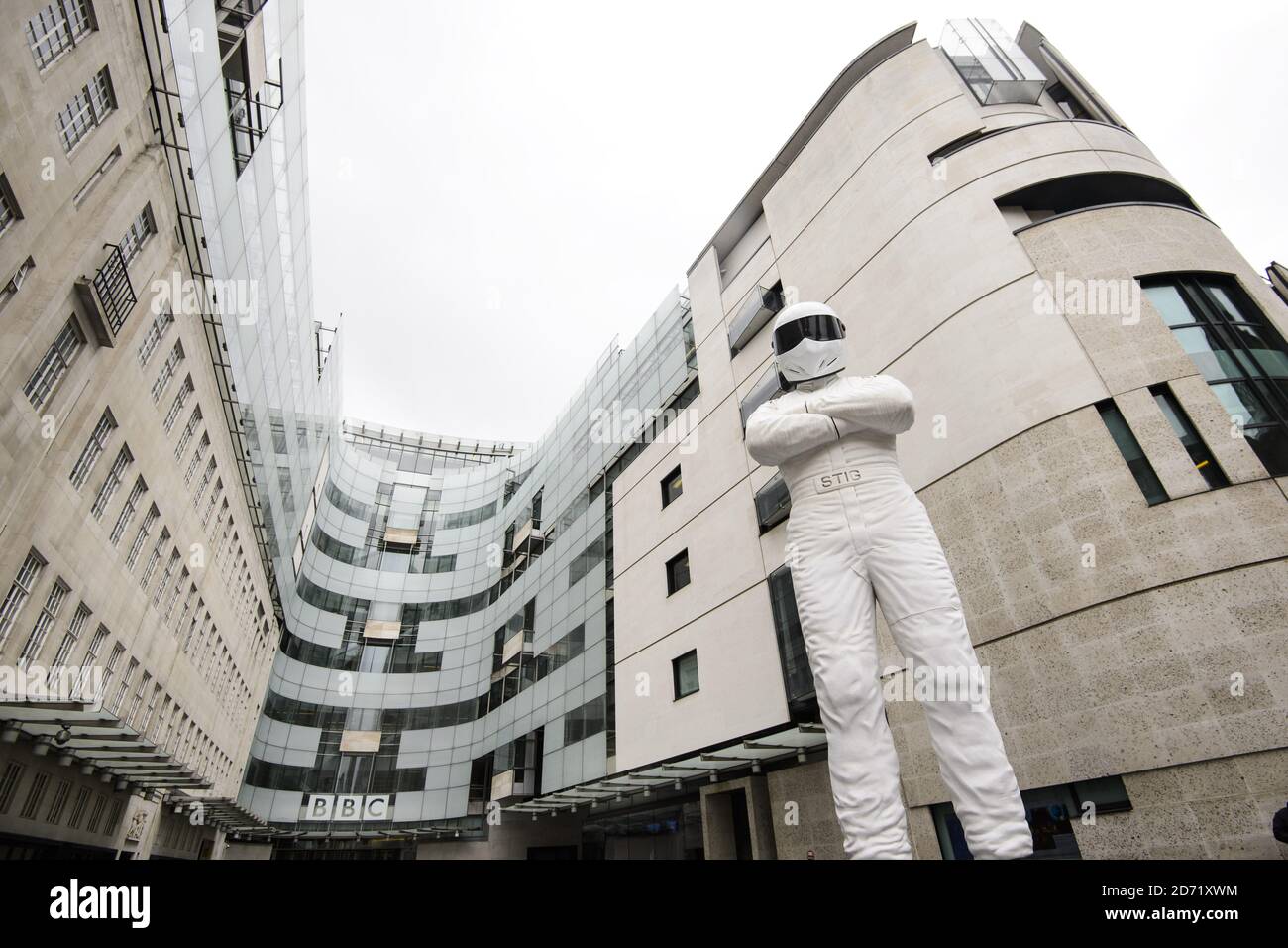 A giant statue of The Stig stands outside BBC Broadcasting House in central London, ahead of the new series of Top Gear which airs later this month. Stock Photo