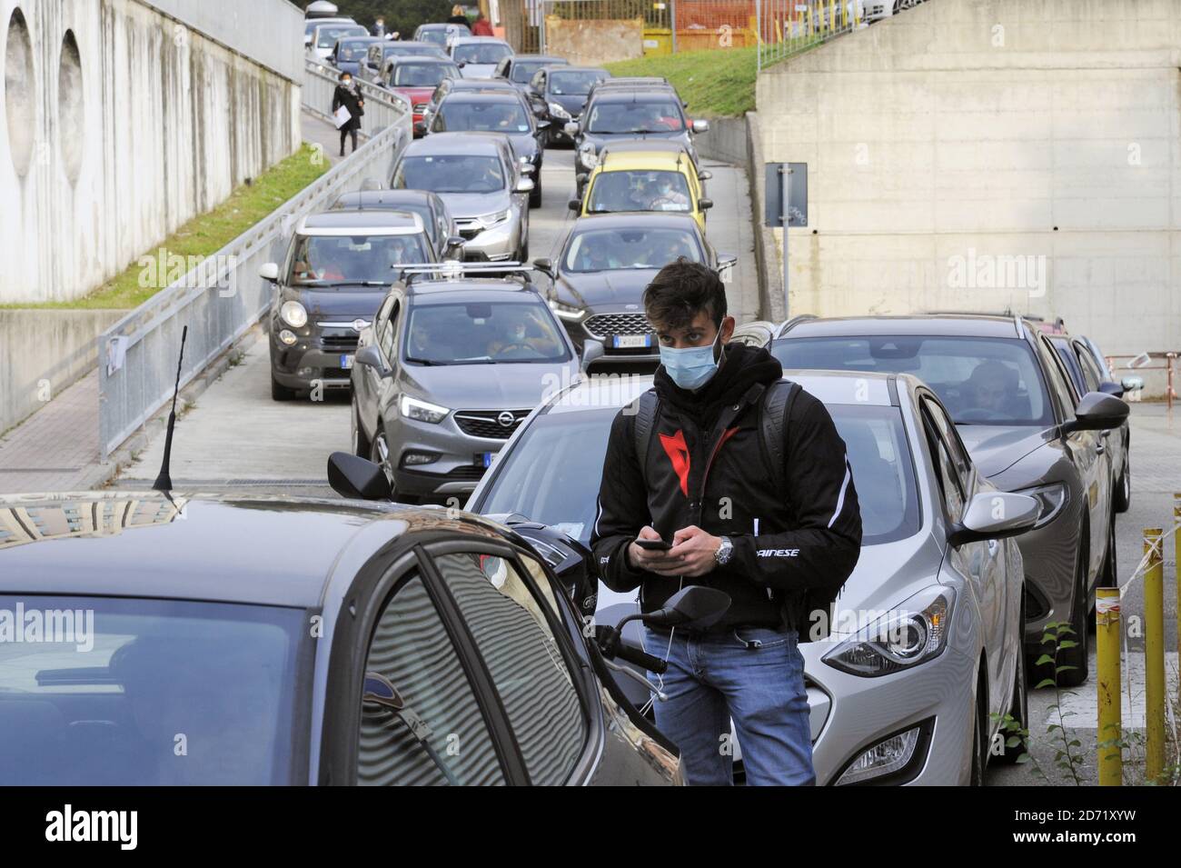 Milan (Italy), San Paolo hospital, in these days long car queues and many hours of waiting in all the hospitals that offer the 'drive through' service for picking up without getting out of car the nasopharyngeal swab  for the diagnosis of  Covid-19 virus infection. Stock Photo