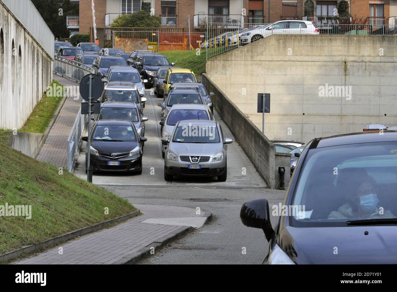 Milan (Italy), San Paolo hospital, in these days long car queues and many hours of waiting in all the hospitals that offer the 'drive through' service for picking up without getting out of car the nasopharyngeal swab  for the diagnosis of  Covid-19 virus infection. Stock Photo