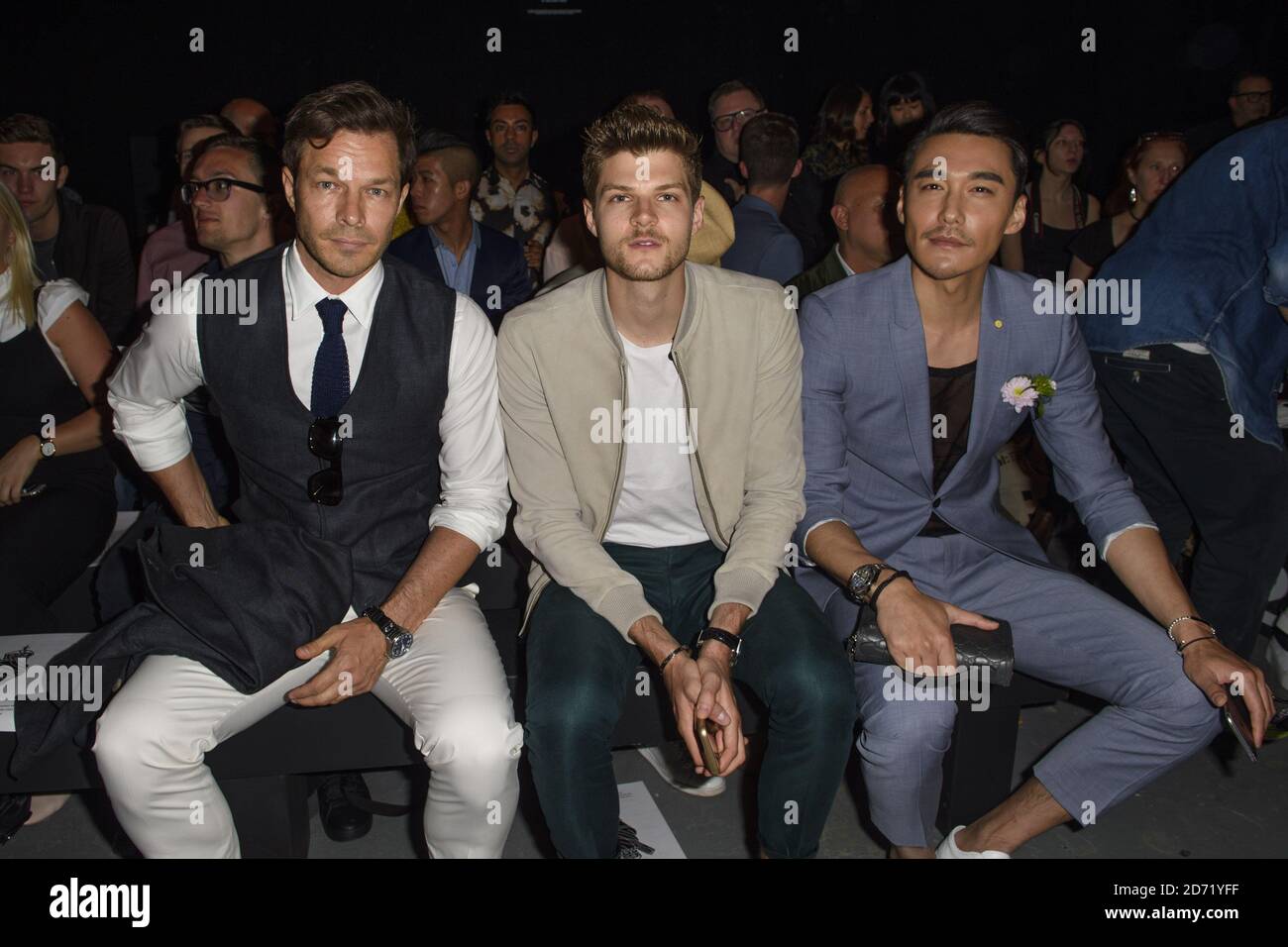 Paul Sculfor, Jim Chapman and Hu Bing at the Top Man Design fashion show, held at the University of Westminster in London as part of London Collections: Men. Stock Photo