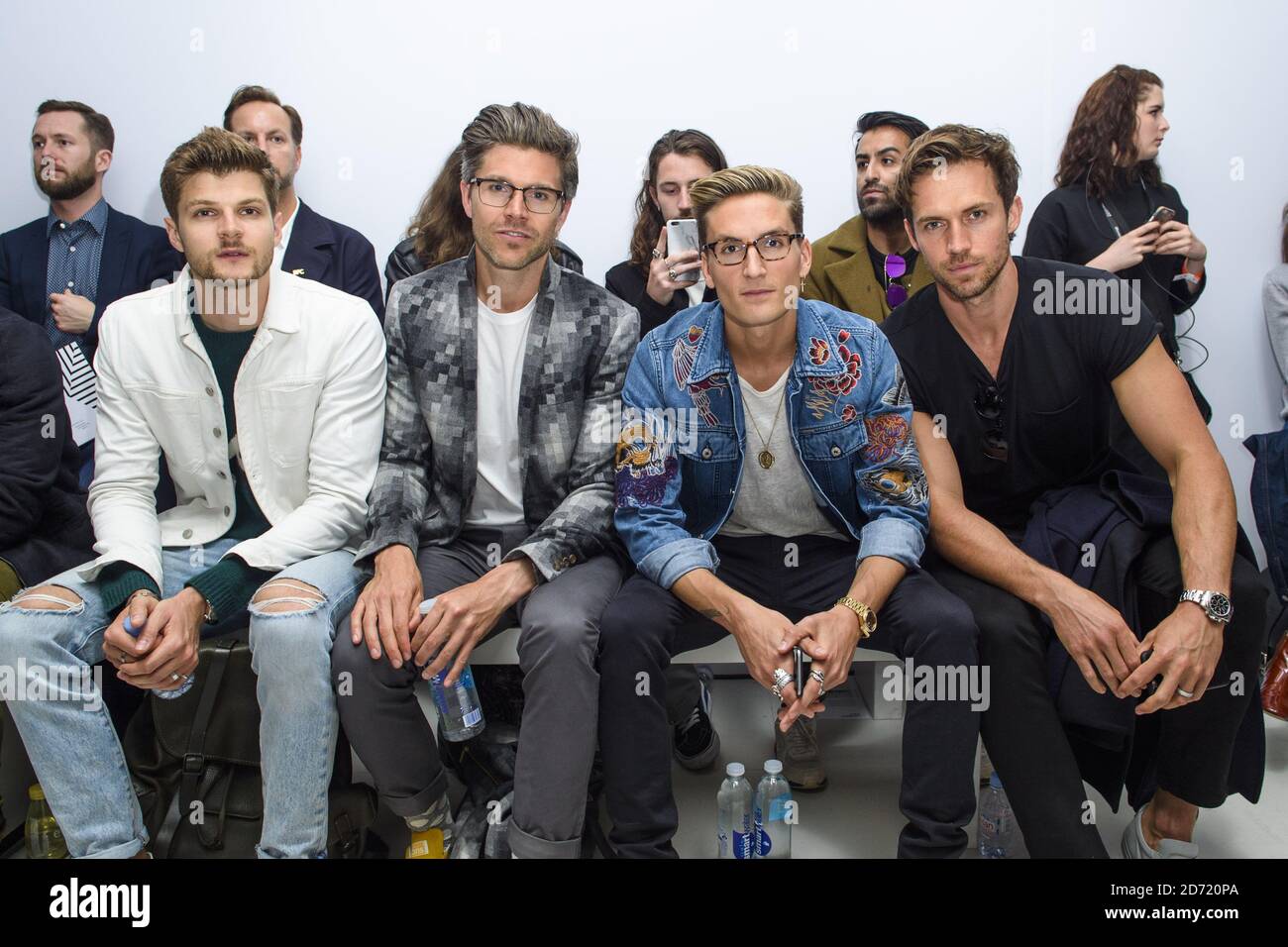 Jim Chapman, Darren Kennedy, Oliver Proudlock and Andrew Cooper on the front row at the Christopher Raeburn fashion show, held at the BFC Venue on 180 Strand as part of London Collections: Men,  Stock Photo