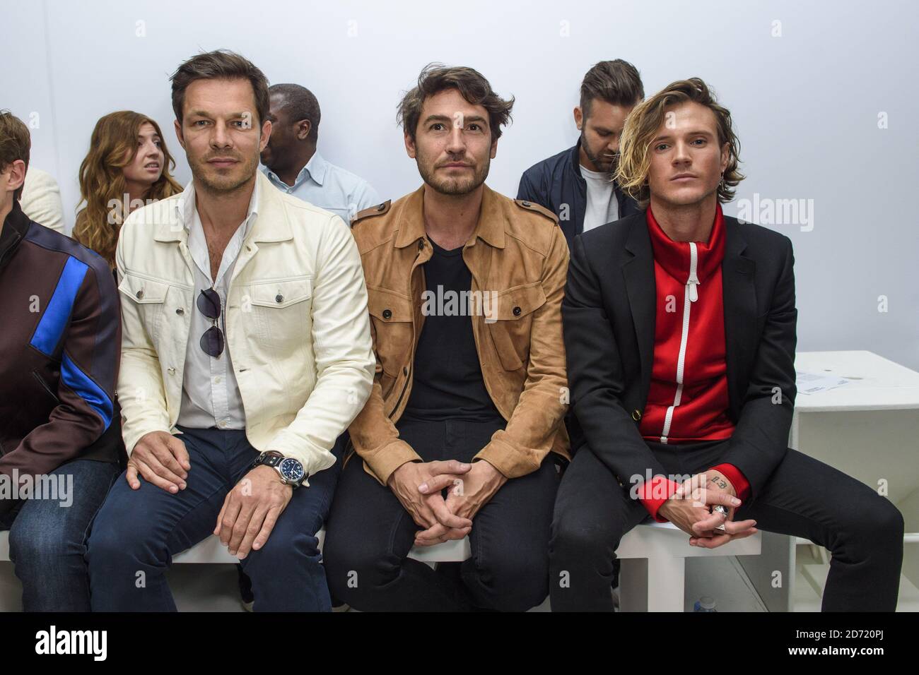 Paul Sculfor, Robert Konjic and Dougie Poynter on the front row at the Christopher Raeburn fashion show, held at the BFC Venue on 180 Strand as part of London Collections: Men,  Stock Photo
