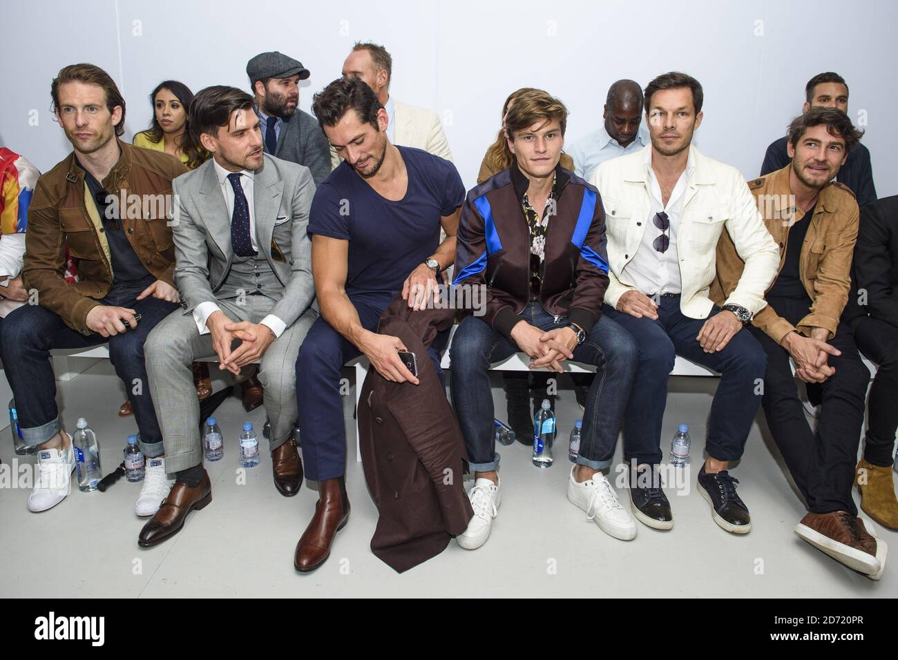David Gandy, Oliver Cheshire, Paul Sculfor and Robert Konjic on the front row at the Christopher Raeburn fashion show, held at the BFC Venue on 180 Strand as part of London Collections: Men, Stock Photo