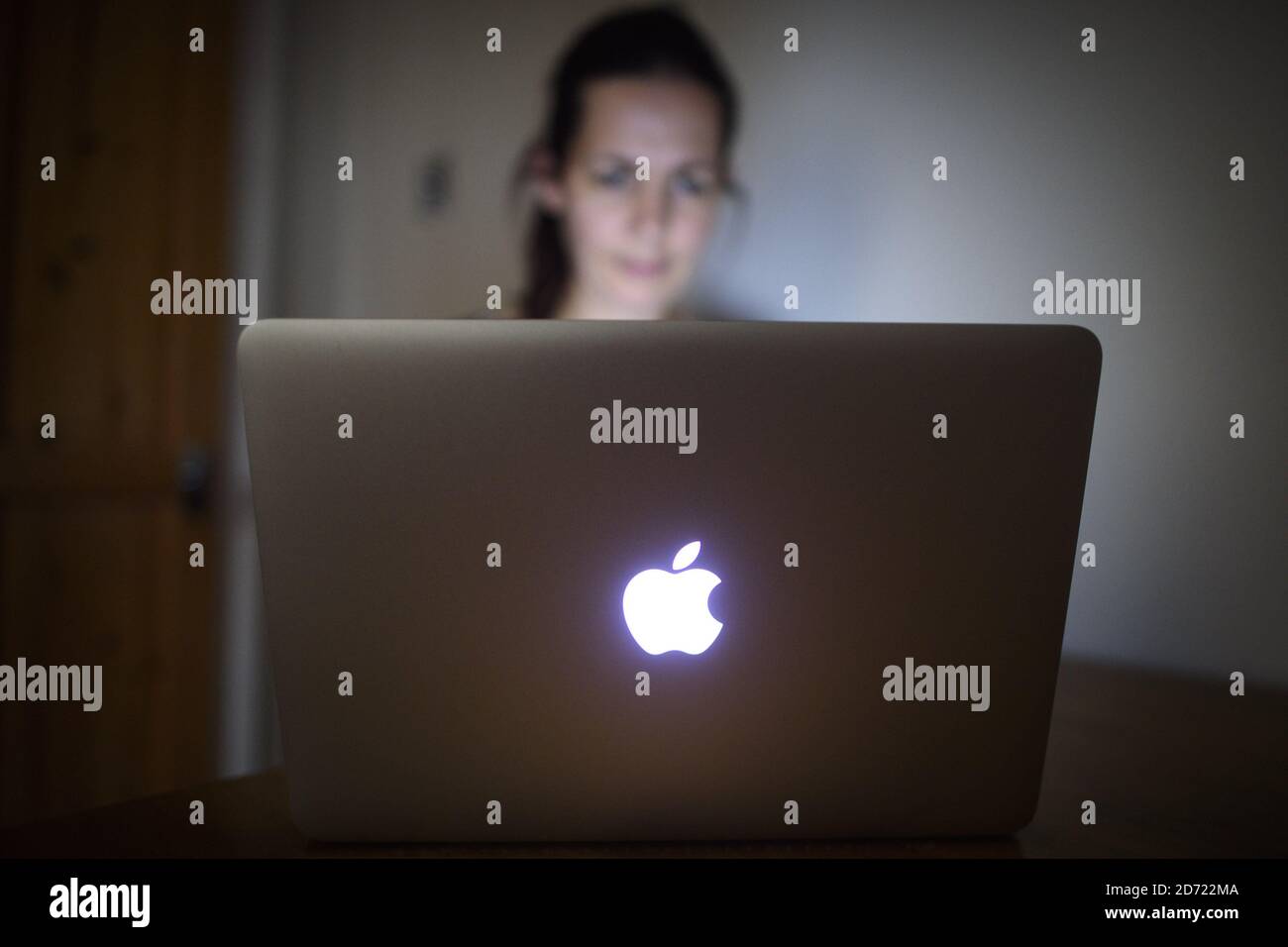A user with an Apple Macbook computer, as the company is facing a multibillion-euro tax bill after a European Union investigation into state aid it received in Ireland. Picture date: Wednesday August 31, 2016. Photo credit should read: Matt Crossick/ EMPICS Entertainment. Stock Photo