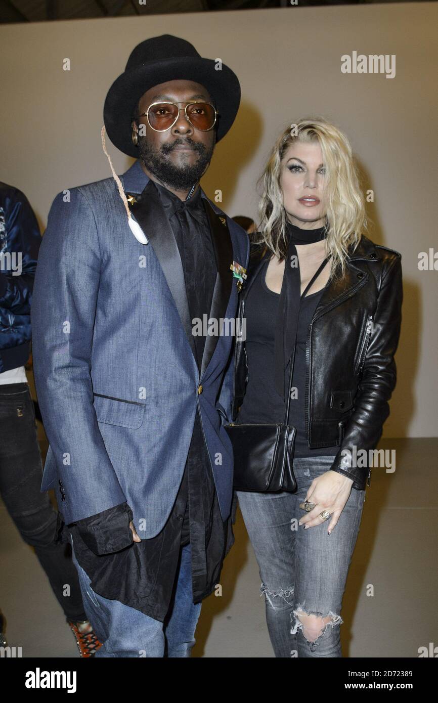 Fergie Duhamel and will.i.am on the front row during the Gareth Pugh Spring/Summer 2017 London Fashion Week show, held at the BFC Show Space, Brewer Street Car Park, London. Picture date: Friday September 16, 2016. Photo credit should read: Matt Crossick/ EMPICS Entertainment. Stock Photo