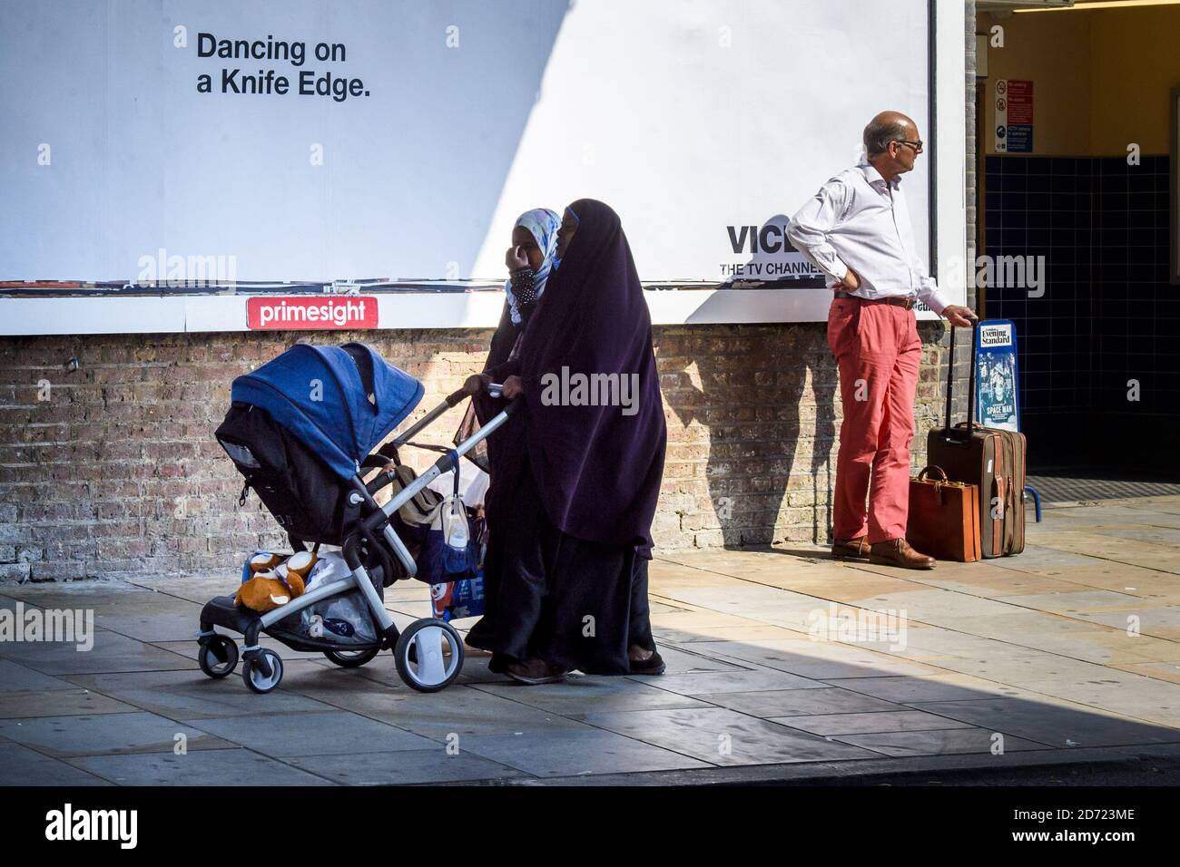 Muslim women along the Uxbridge Road in Shepherd's Bush, west London. September 30th will mark 100 days since the UK voted to leave the EU, during which time reported anti-immigrant and islamophobic hate crimes have increased. Stock Photo