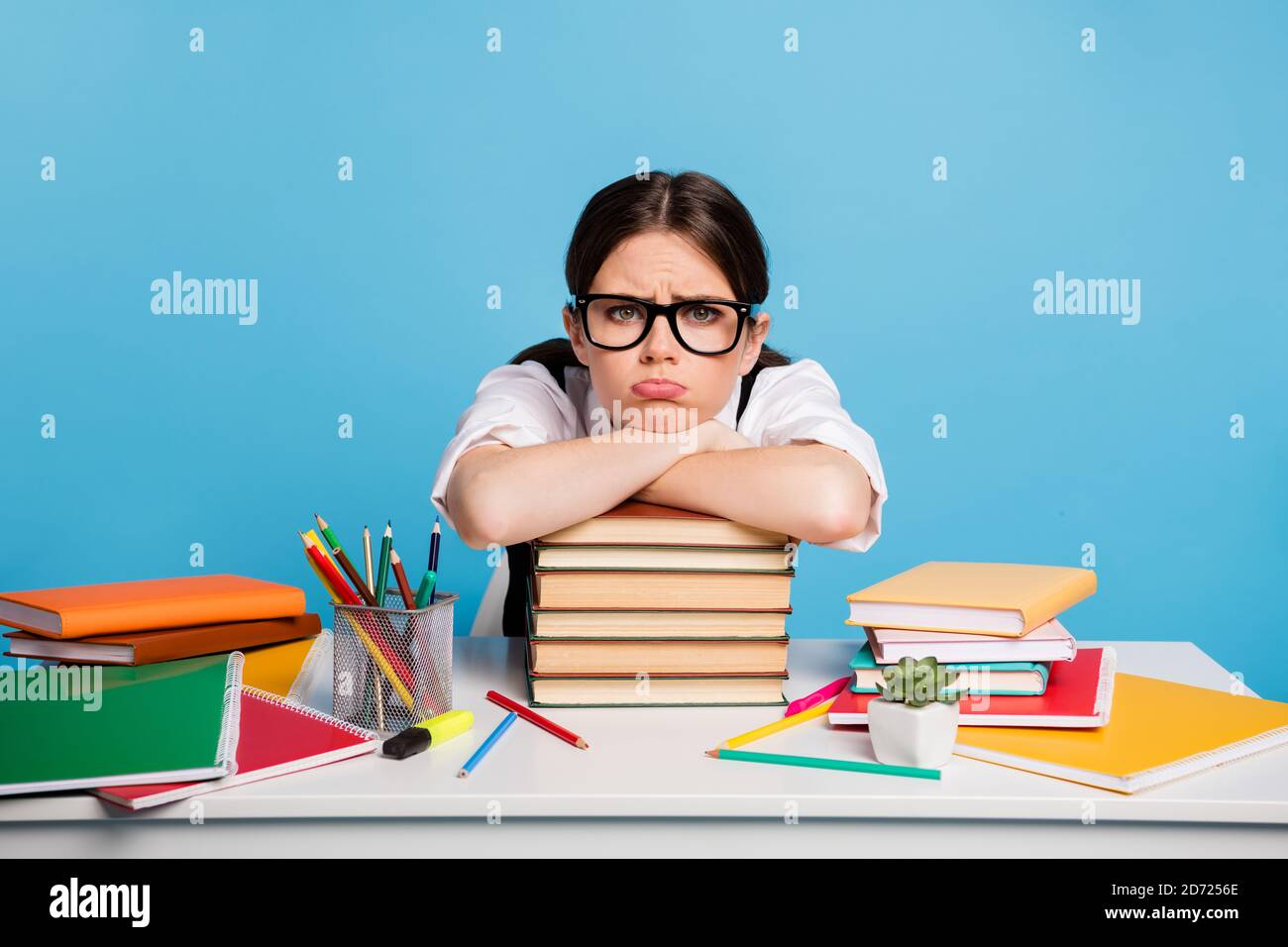 Photo of frustrated university student girl sit table put hands head
