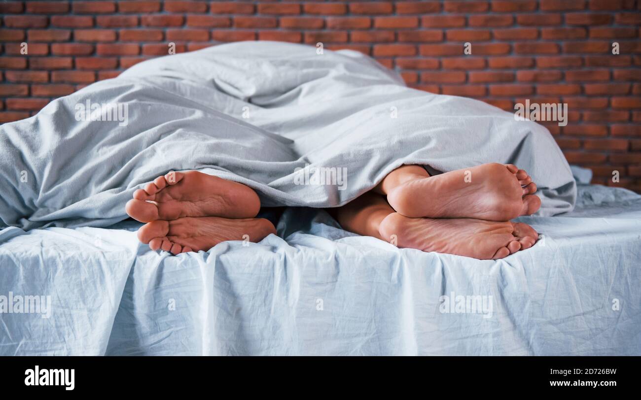 Close Up View Of Foots Of Couple That Sleeps Together In The Bedroom At Morning Time Stock Photo Alamy Close Up View Of Foots Of Couple That Sleeps Together In The Bedroom At Morning Time Stock Photo Alamy