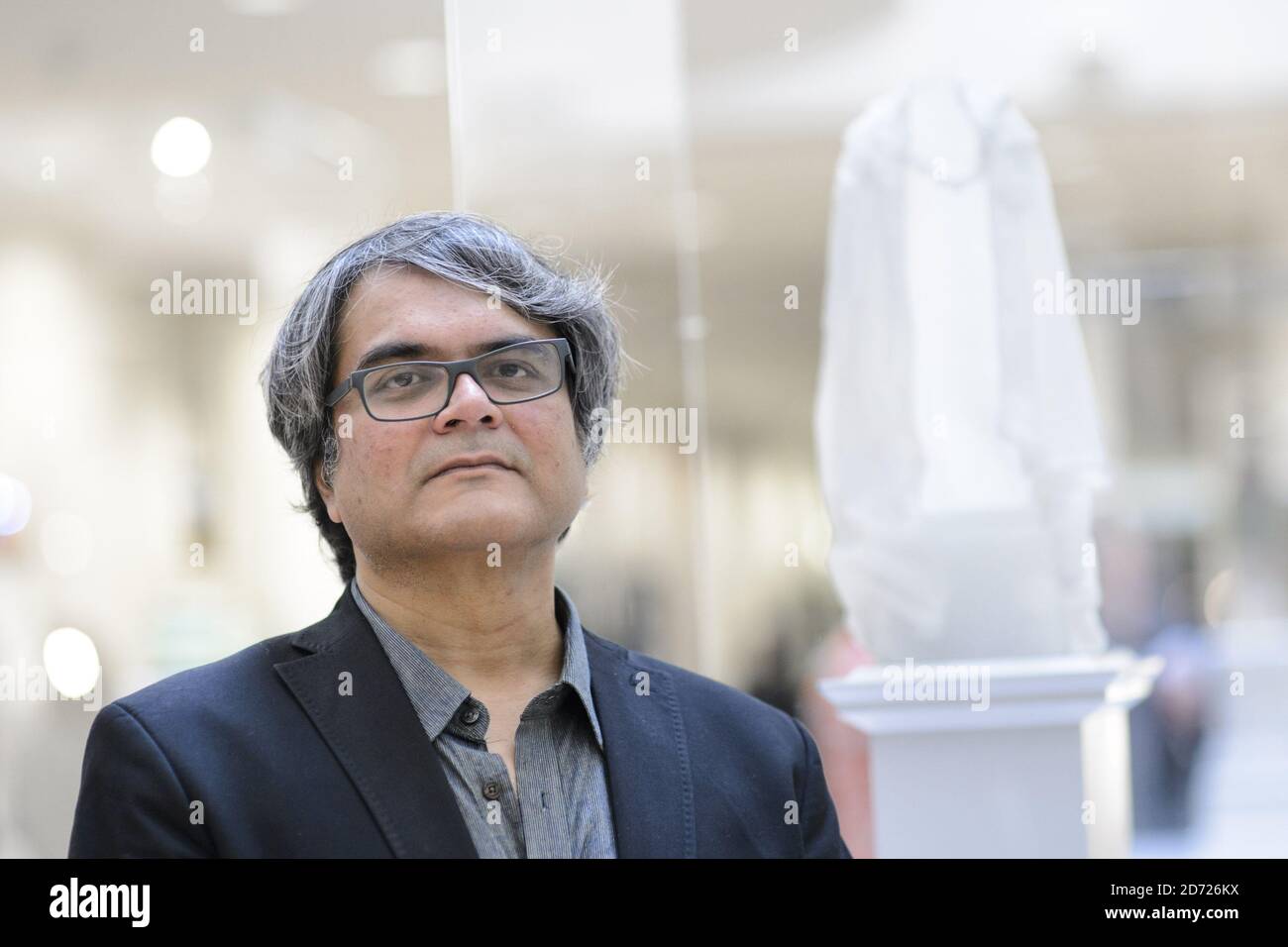Artist Shuddhabrata Sengupta pictured with his work The Emperor's Old Clothes, at an exhibition showing the shortlist of models for the Trafalgar Square Fourth Plinth commission, at the National Gallery in London. The exhibition will run until 26 March 2017. Picture date: Thursday January 19, 2017. Photo credit should read: Matt Crossick/ EMPICS Entertainment.  Stock Photo