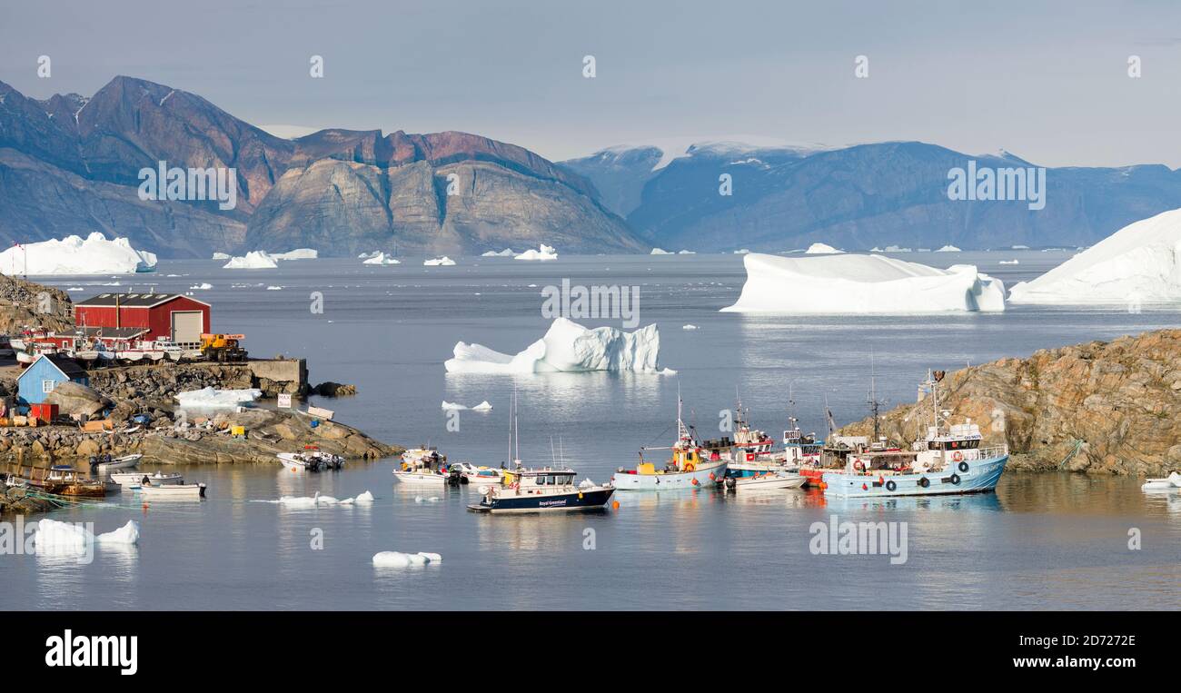The harbour with typical fishing boats.  Small town Uummannaq in the north of west greenland.   America, North America, Greenland, Denmark Stock Photo