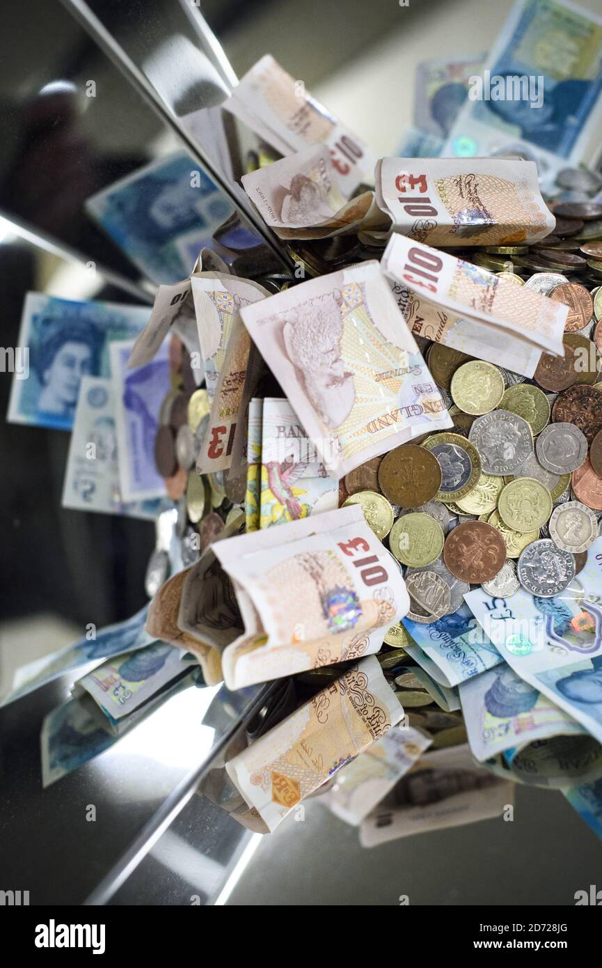 UK bank notes and coins of various denominations. Picture date