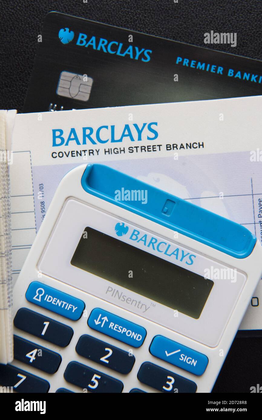A Barclays Bank cheque book, online banking PINSentry and cheque book. Barclays is currently the 6th most valuable British brand, according to analysts Brand Finance's directory. Picture date: Friday March 10, 2017. Photo credit should read: Matt Crossick/ EMPICS Entertainment. Stock Photo