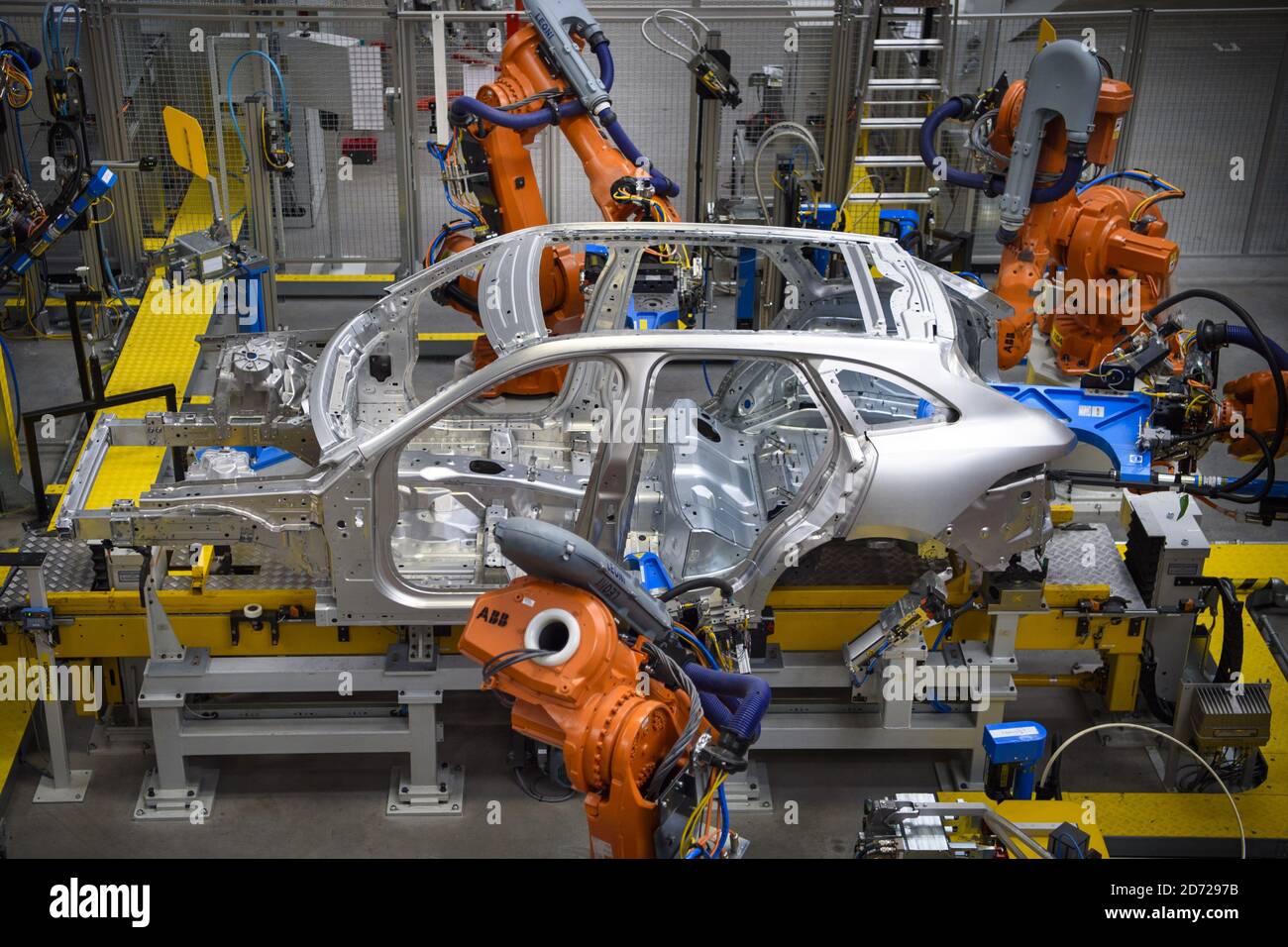 Cars being manufactured in the Aluminium Body Shop, part of Jaguar Land Rover's Advanced Manufacturing Facility in Solihull, Birmingham. Picture date: Wednesday March 15th, 2017. Photo credit should read: Matt Crossick/ EMPICS. Aluminium Body Shop 3 is Europe's largest aluminium body shop, and contains nearly 800 robots building Jaguar F-Pace and Range Rover Velar cars. It is capable of producing an aluminium car body every 76 seconds.  Stock Photo