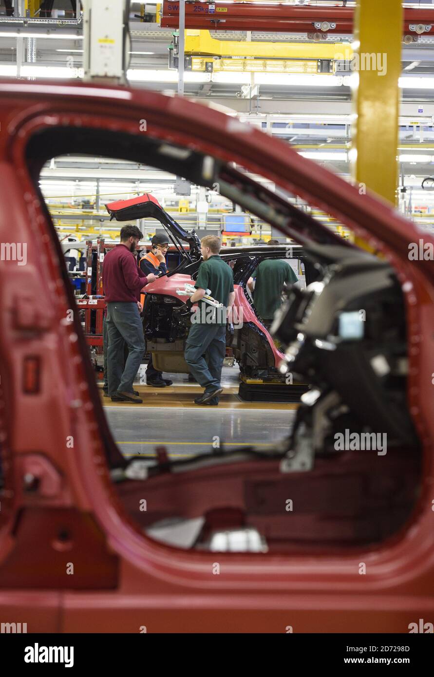 Cars on the Final Assembly line, part of Jaguar Land Rover's Advanced Manufacturing Facility in Solihull, Birmingham. Picture date: Wednesday March 15th, 2017. Photo credit should read: Matt Crossick/ EMPICS. The Final Assembly facility is the size of 12 football pitches, and sees the final assembly of Range Rover Sport, Range Rover Velar and Jaguar F-PACE cars. Jaguar Land Rover exports 80% of cars produced in the UK, to over 136 markets worldwide.  Stock Photo