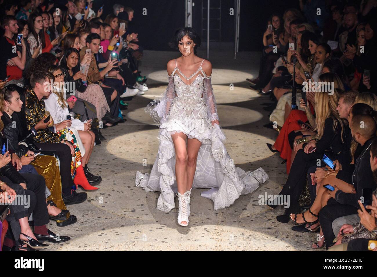 Eliza Cummings on the catwalk during the Julien Macdonald London Fashion Week SS18 show, held at