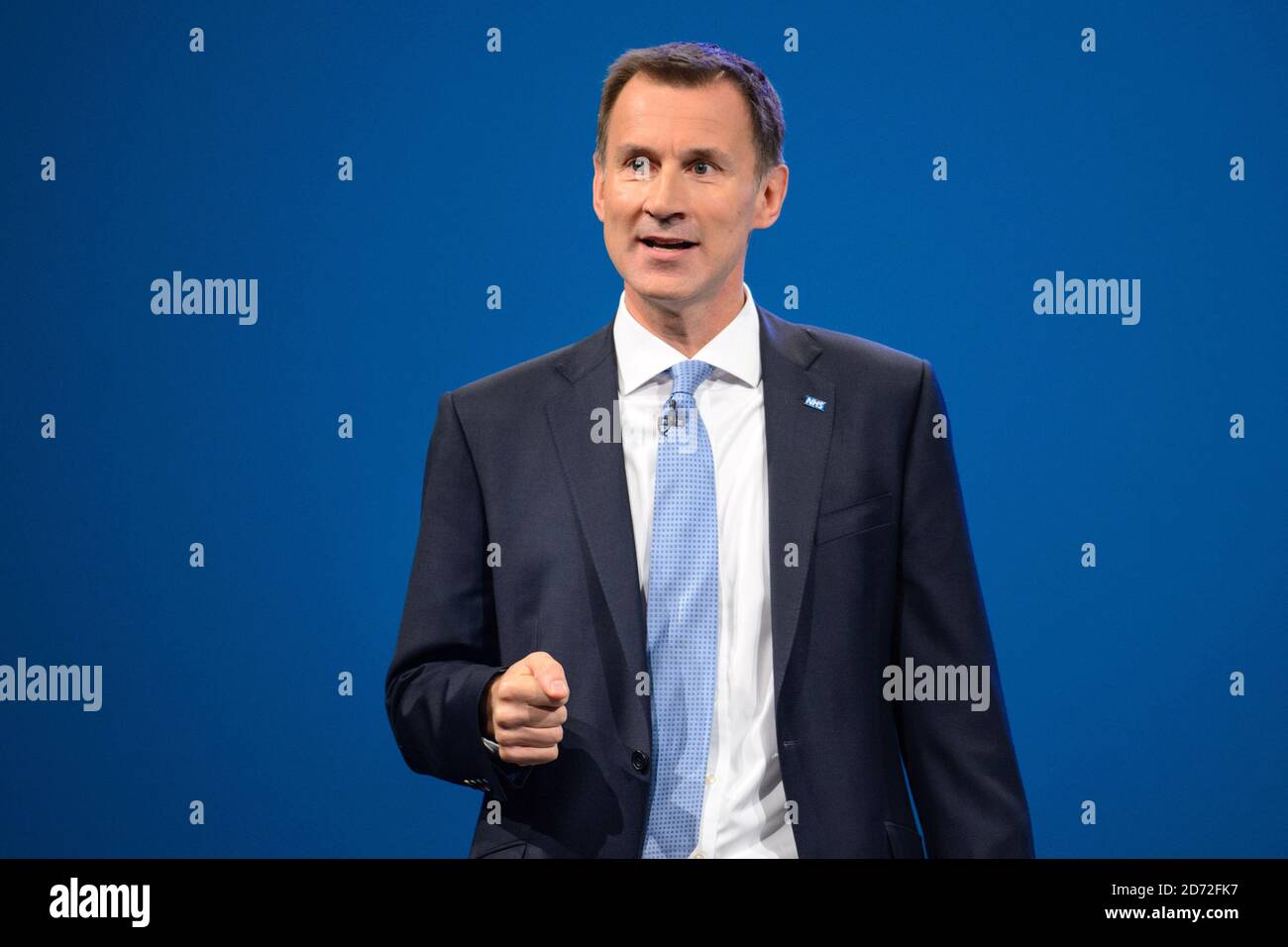 Health secretary jeremy hunt gestures hi-res stock photography and ...