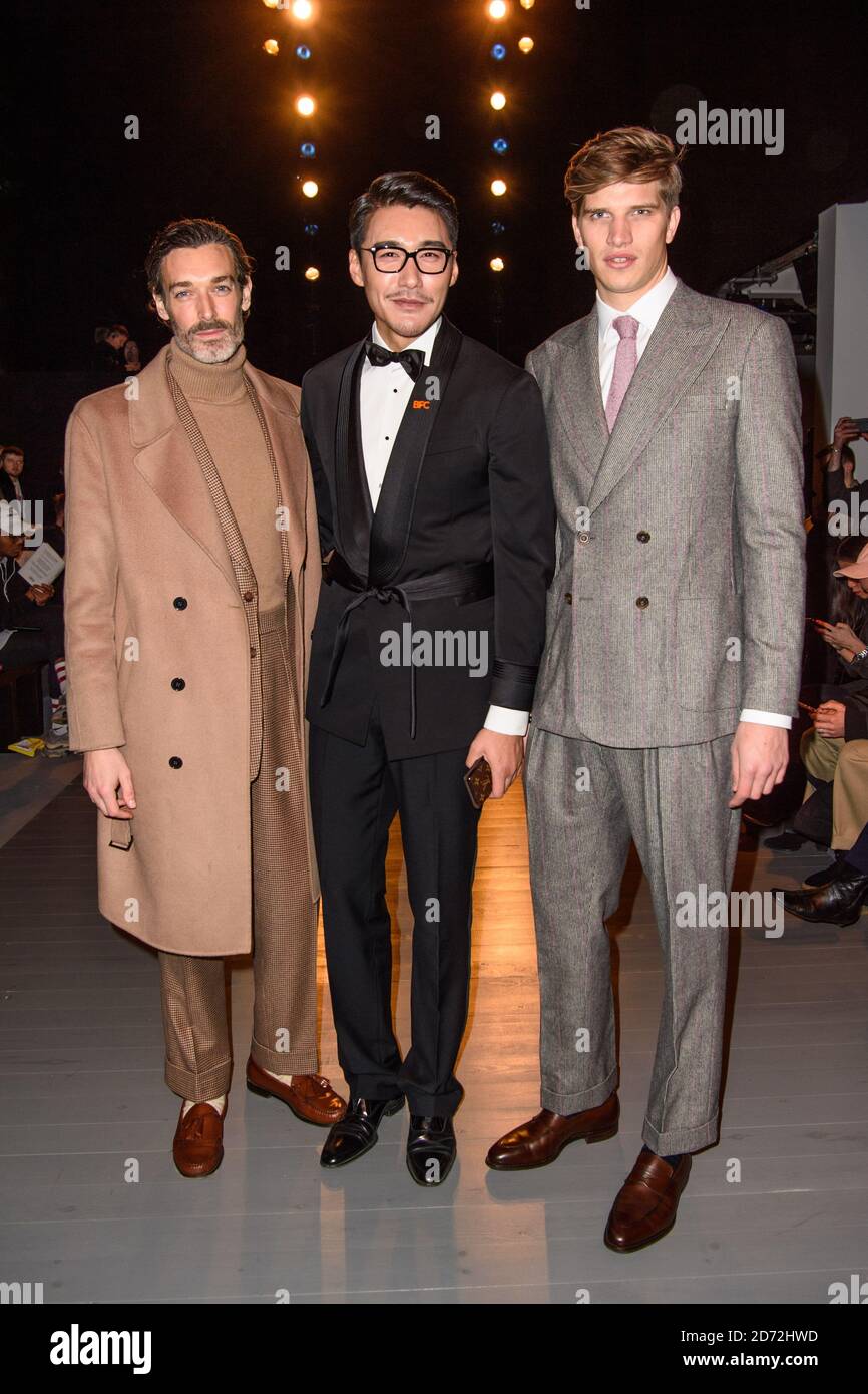 Richard Biedul, Hu Bing and Toby Huntington-Whiteley on the front row during the John Lawrence Sullivan London Fashion Week Men's AW18 show, held at BFC Show Space, London. Picture date: Saturday January 6th, 2018. Photo credit should read: Matt Crossick/ EMPICS Entertainment. Stock Photo