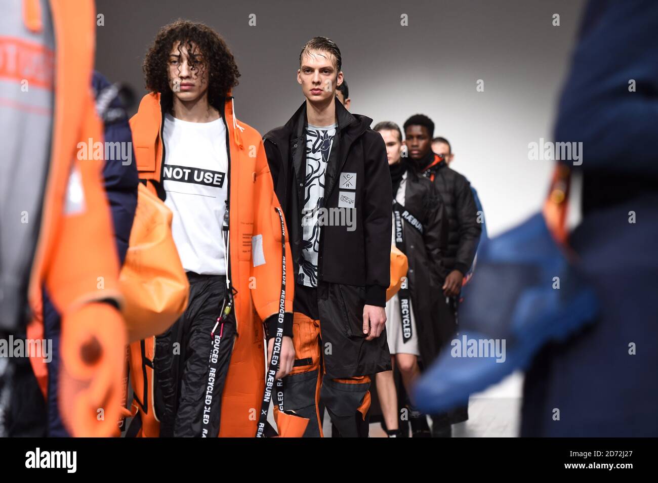 Models on the catwalk during the Christopher Raeburn London Fashion Week Men's AW18 show, held at the BFC Show space, London. Picture date: Sunday January 7th, 2018. Photo credit should read: Matt Crossick/ EMPICS Entertainment. Stock Photo