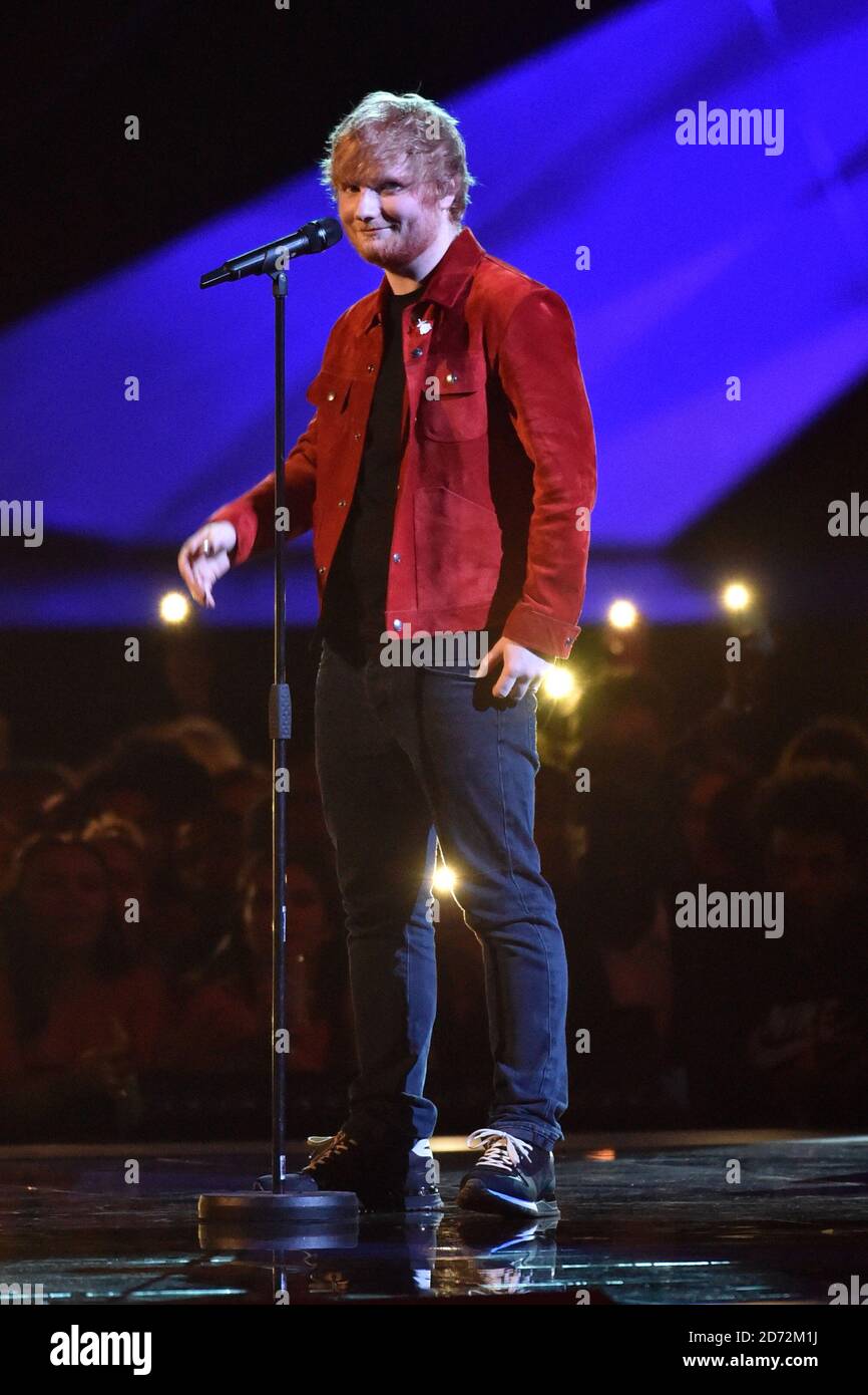 EDITORIAL USE ONLY. Ed Sheeran performs on stage at the Brit Awards at ...