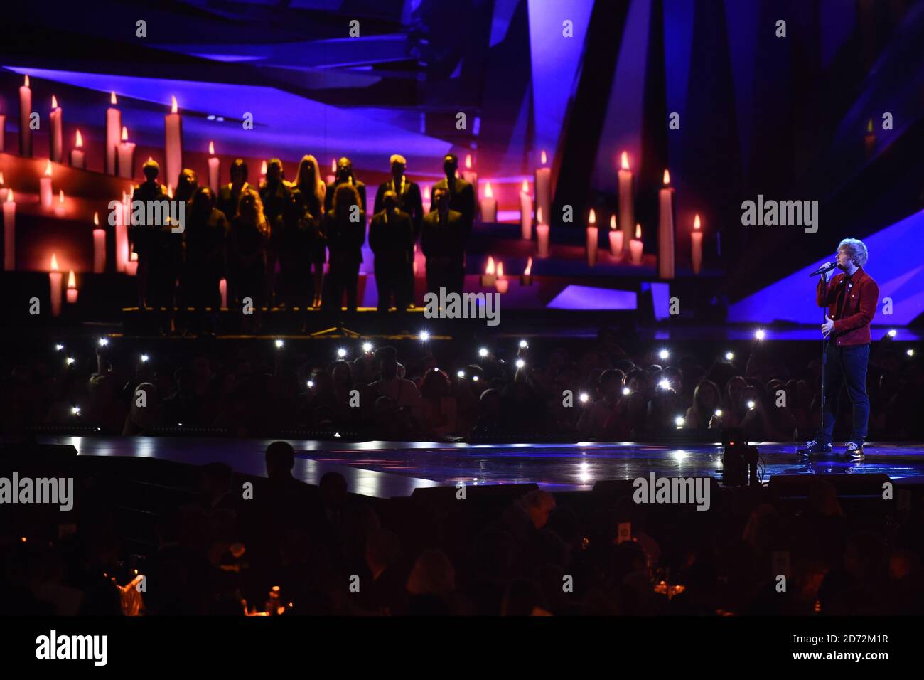 EDITORIAL USE ONLY. Ed Sheeran performs on stage at the Brit Awards at ...