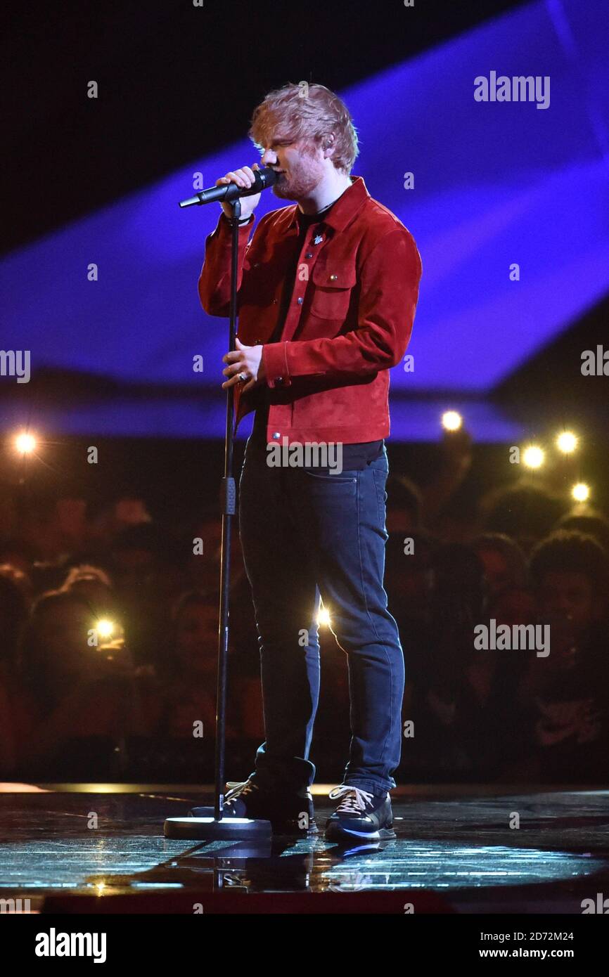 EDITORIAL USE ONLY. Ed Sheeran performs on stage at the Brit Awards at ...