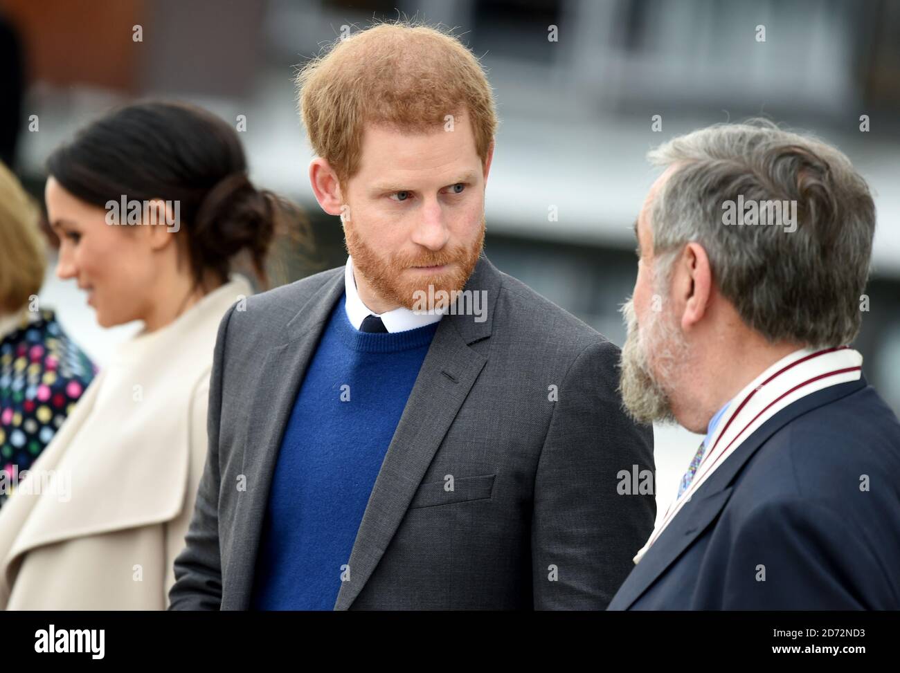 Prince Harry and Meghan Markle leave after a visit to the Titanic Belfast maritime museum in Belfast. Stock Photo