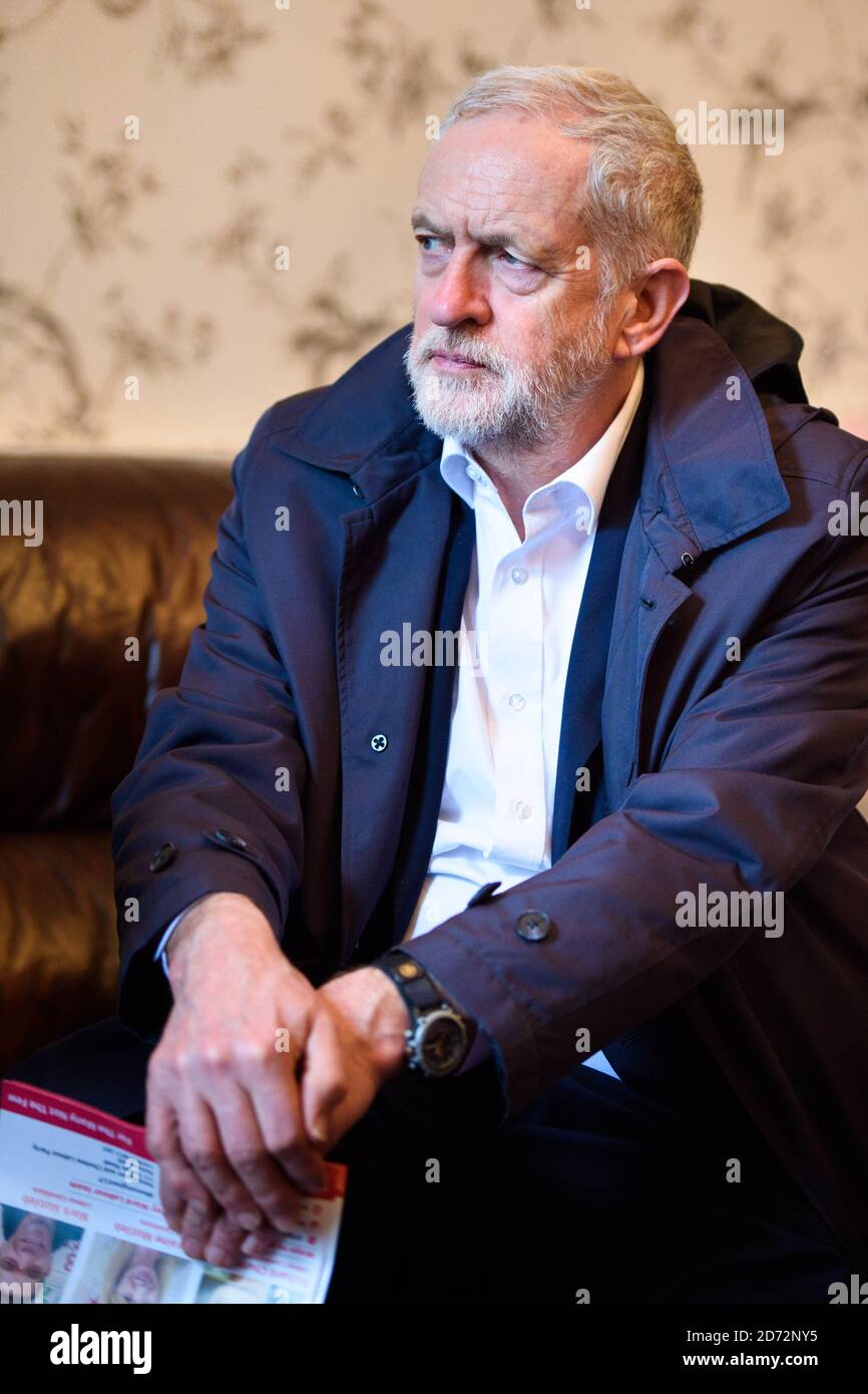 Labour leader Jeremy Corbyn talks to resident Lorna Sherlock in her home in Elm Park Gardens, Chelsea, as he joins a canvassing session with local Labour candidates ahead of the local elections. Picture date: Monday April 9th, 2018. Photo credit should read: Matt Crossick/ EMPICS Entertainment. Stock Photo