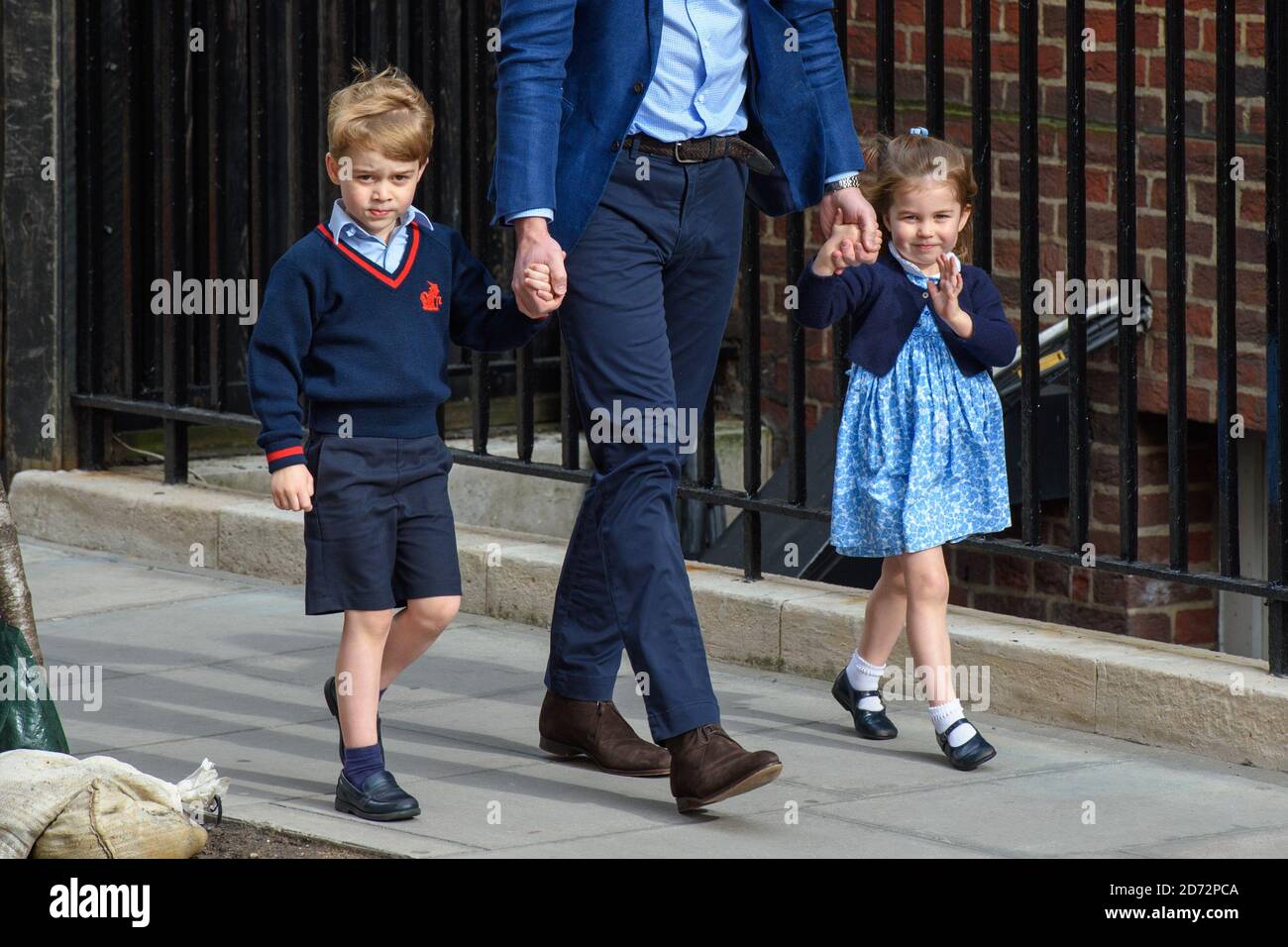 The Duke of Cambridge with Prince George and Princess Charlotte arriving at the Lindo Wing at St Mary's Hospital in Paddington, London. Photo credit should read: Matt Crossick/EMPICS Entertainment Stock Photo