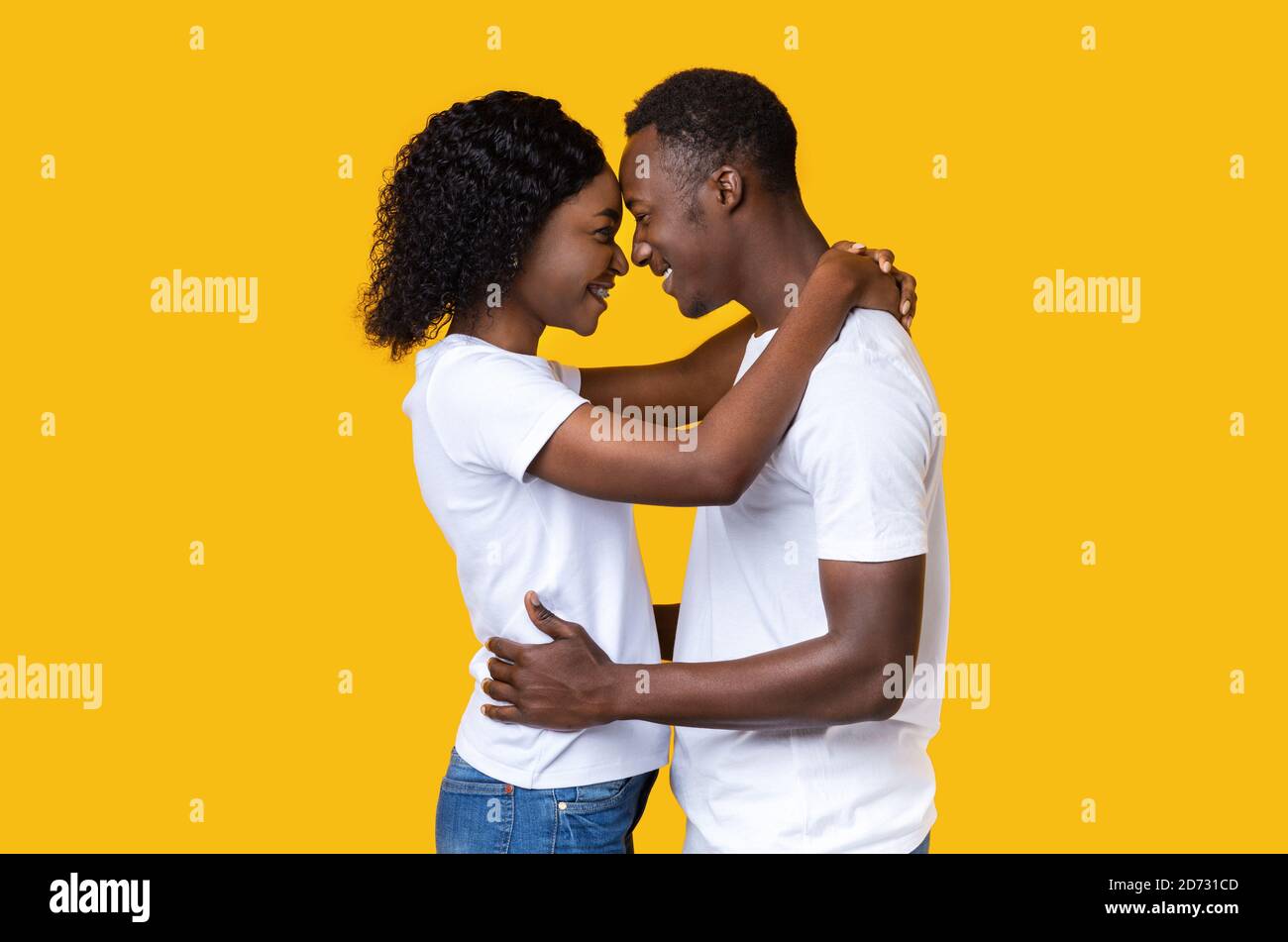 Black lovers hugging and looking at each other Stock Photo Alamy