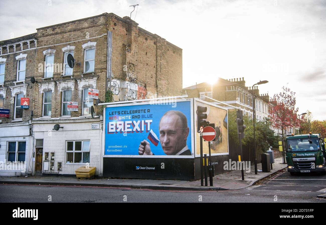 A billboard from an organisation named Proud Bear, showing an image of  Vladimir Putin and reading 'Let's celebrate a red white and blue Brexit',  pictured in Stoke Newington, north London. Picture date: