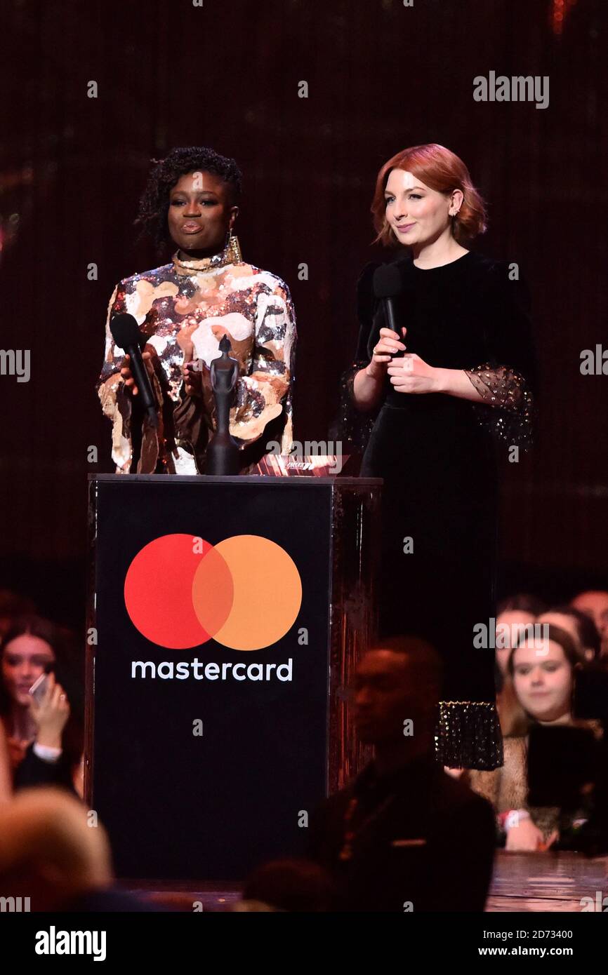 Clara Amfo and Alice Levine on stage at the Brit Awards 2019 at the O2 Arena, London. Photo credit should read: Matt Crossick/EMPICS Entertainment. EDITORIAL USE ONLY Stock Photo