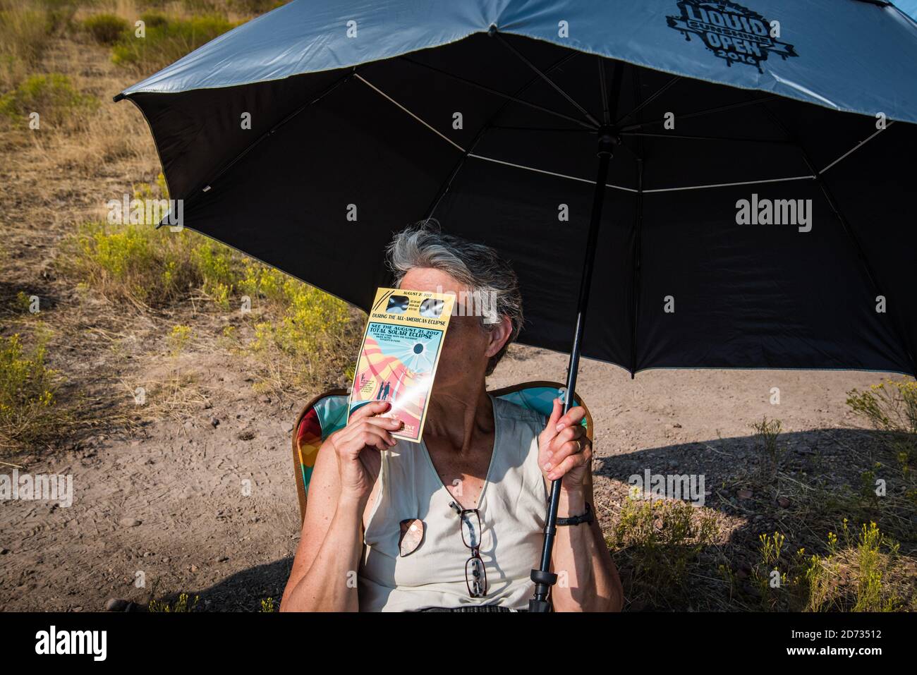 Eye protection during Total solar eclipse 2017, in the Painted Hills, in eastern Oregon,USA,   John Day Fossil Beds National Monument Stock Photo