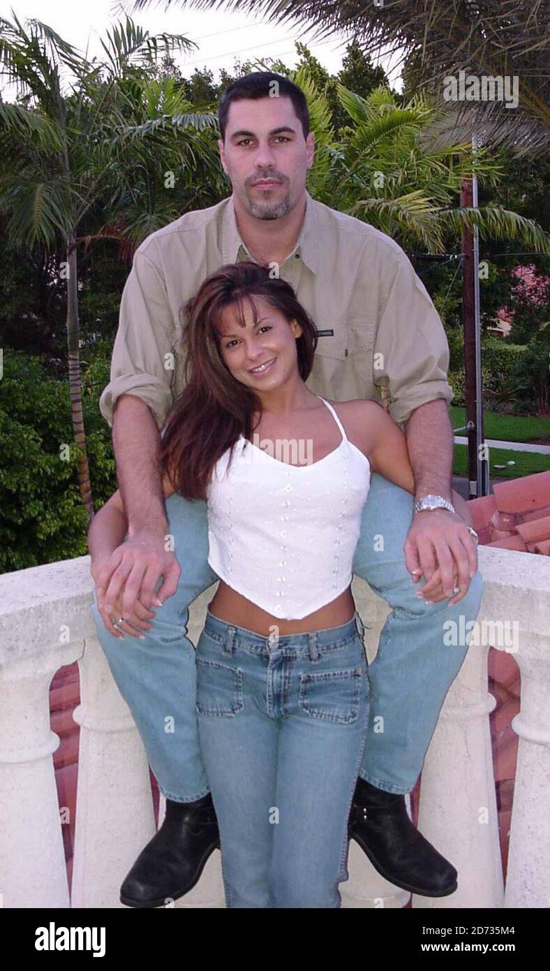 Fitness model and Miami dolphins cheerleader Liz Romero with millionaire boyfriend, Shawn Lewis, at his home on Miami Beach  5/6/00 [[tag]] Stock Photo