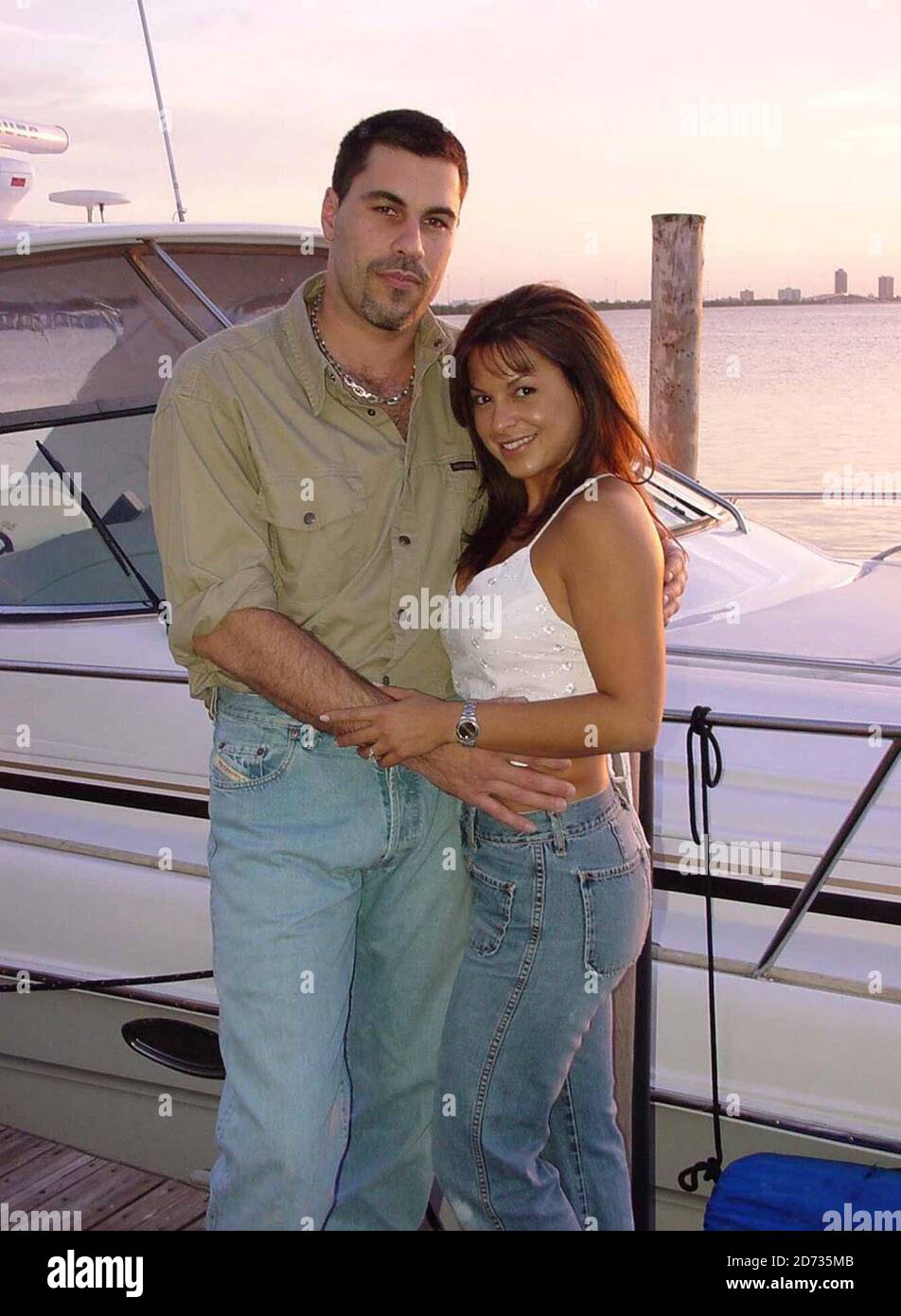 Fitness model and Miami dolphins cheerleader Liz Romero with millionaire boyfriend, Shawn Lewis, at his home on Miami Beach  5/6/00 [[tag]] Stock Photo