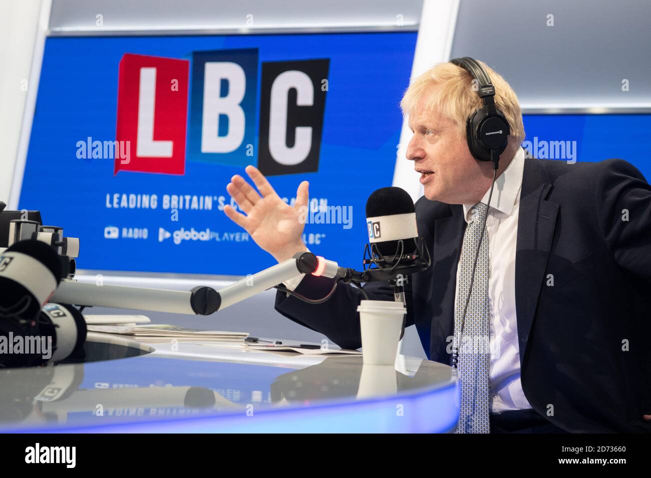 Boris Johnson pictured during a live phone in with LBC presenter Nick  Ferrari, at their studios