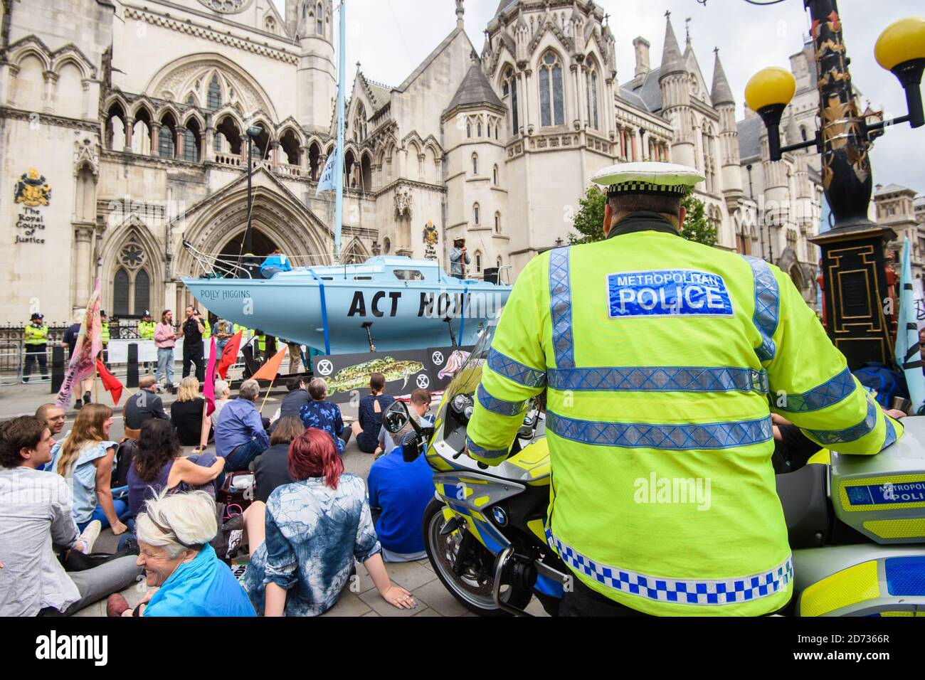 Protesters from environmental campaign group Extinction Rebellion block the road outside the Royal Courts of Justice in central London.  Picture date: Monday July 15, 2019. Photo credit should read: Matt Crossick/Empics Stock Photo