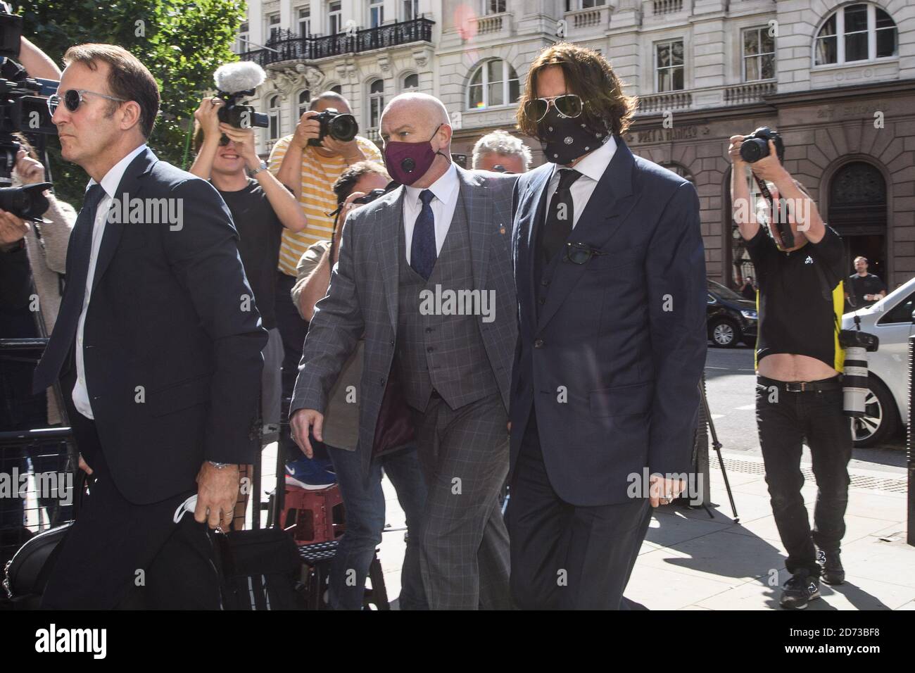 Johnny Depp Actor Johnny Depp arriving at the High Court in London for a hearing in his libel case against the publishers of The Sun, and its executive editor, Dan Wootton. Picture date: Tuesday July 7, 2020. Photo credit should read: Matt Crossick/Empics Stock Photo